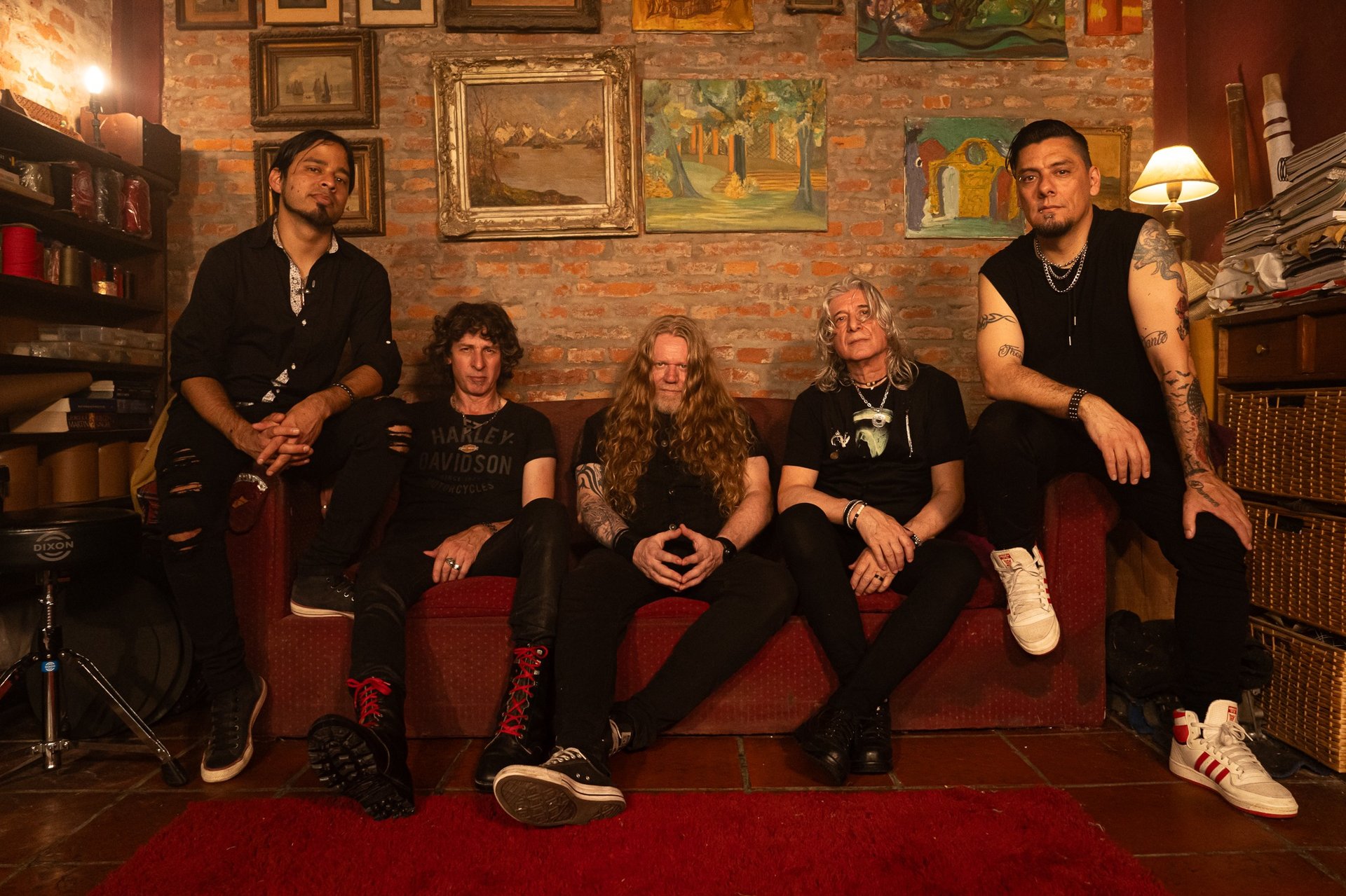 an abstract photo of a curved building with a blue sky in the background