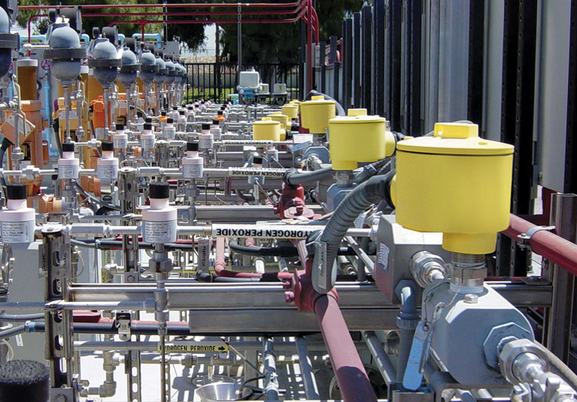 a group of large metal tanks sitting next to each other