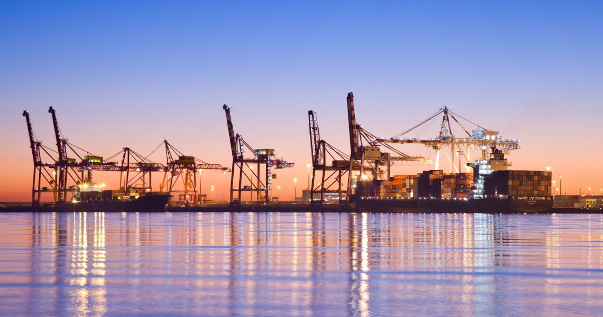 woman wearing yellow long-sleeved dress under white clouds and blue sky during daytime