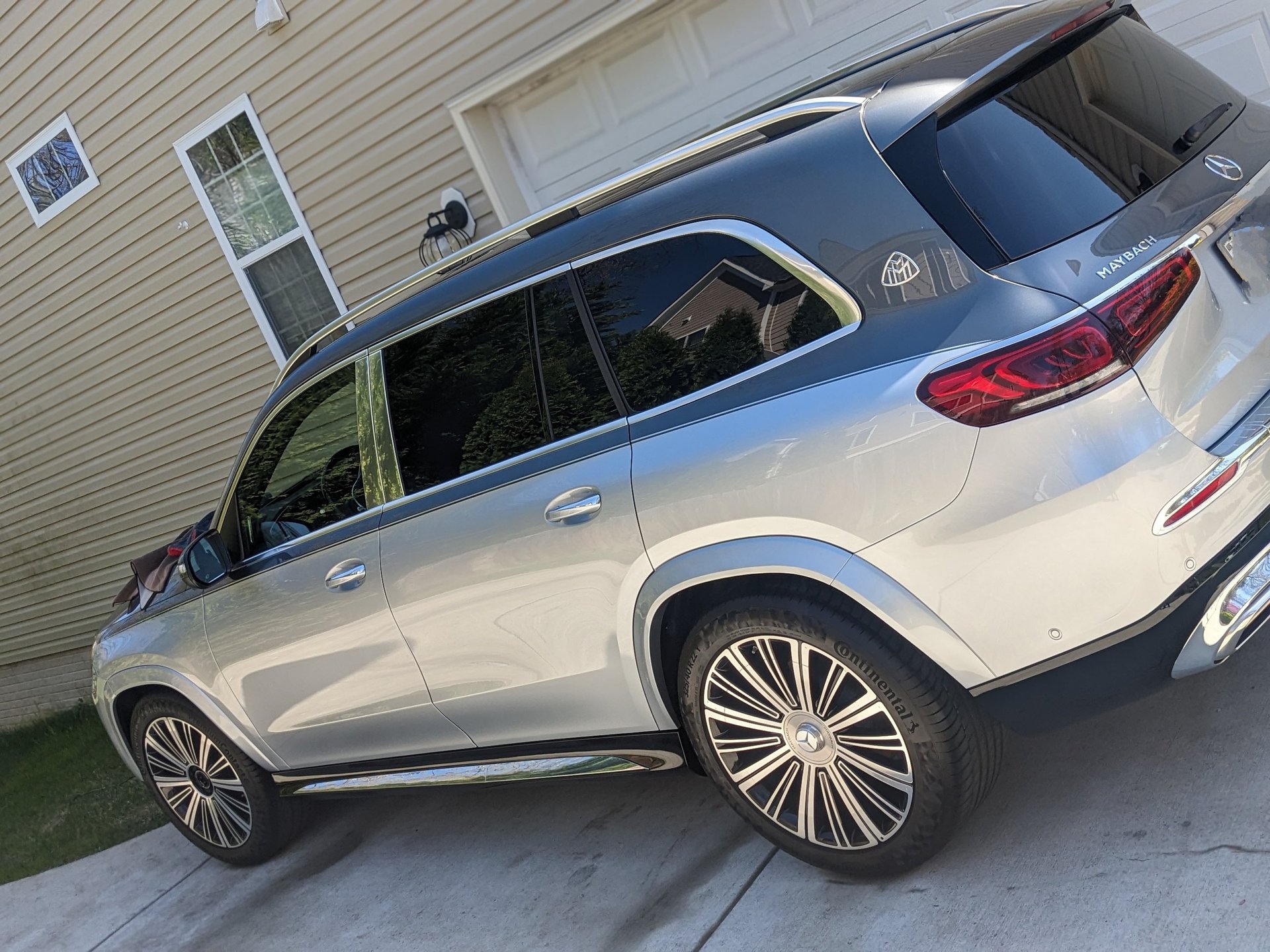 black and brown leather padded tub sofa