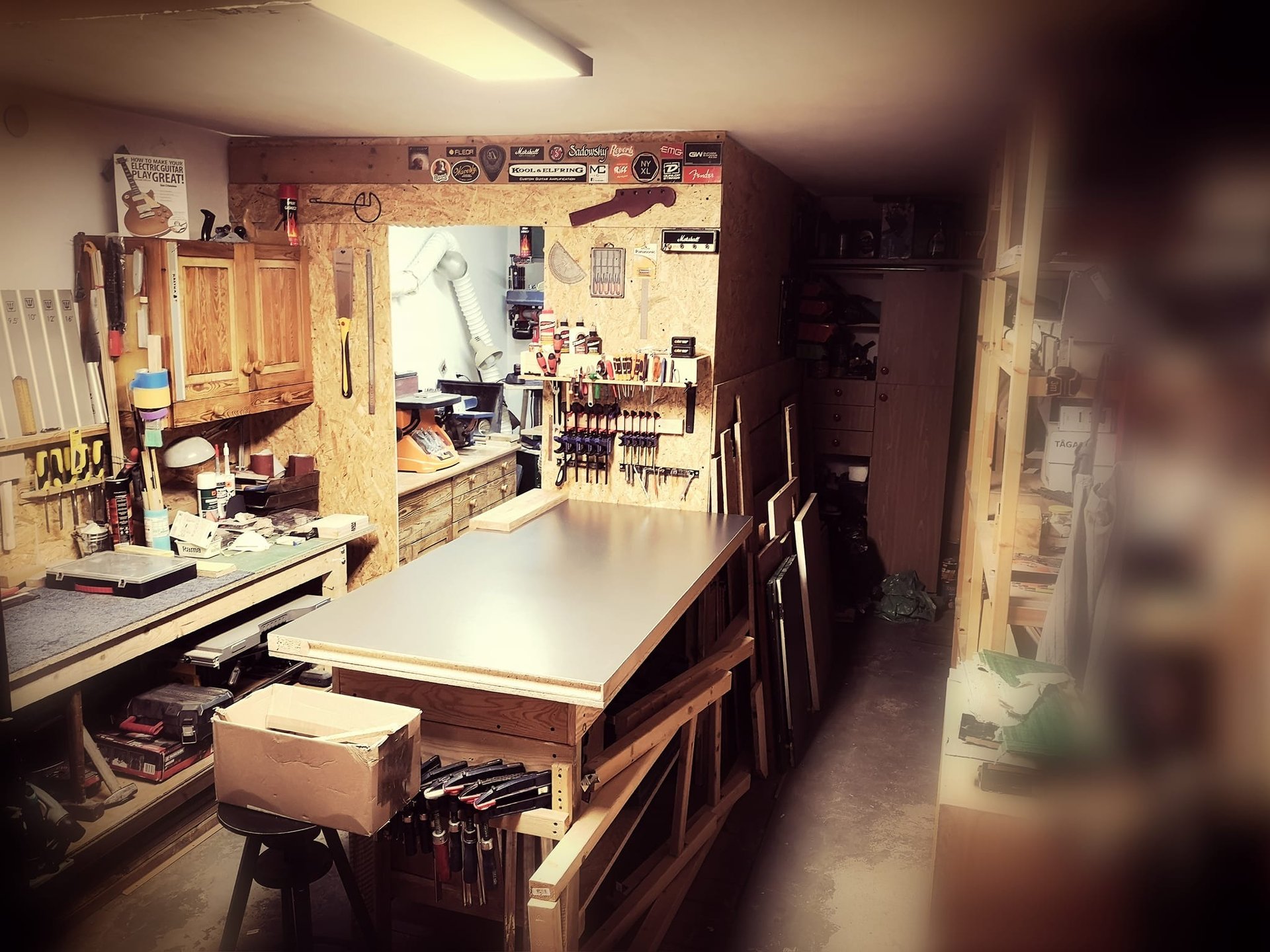 an abstract photo of a curved building with a blue sky in the background