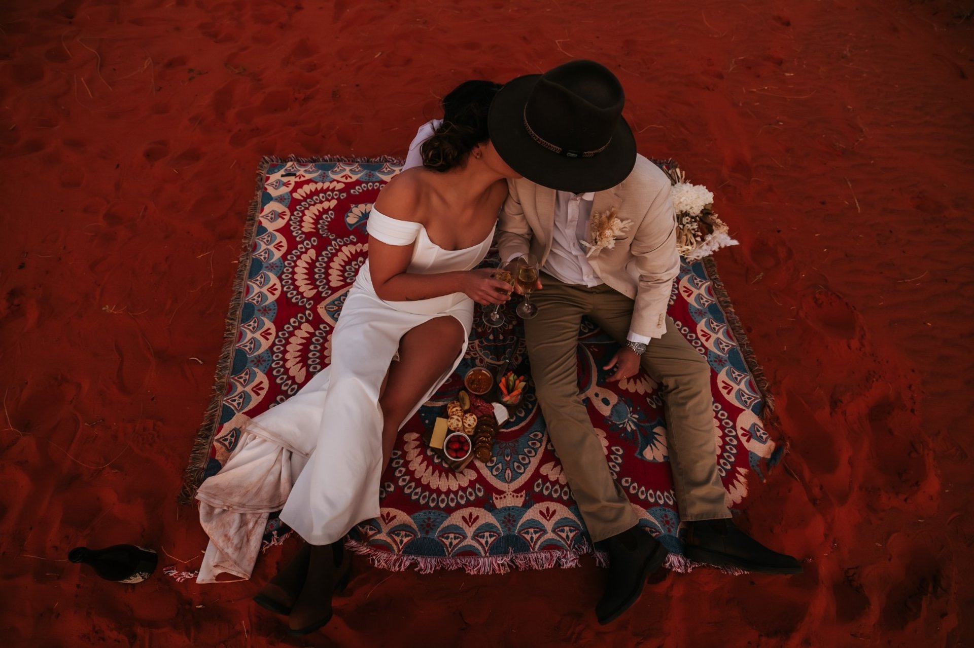 couple wearing silver-colored rings