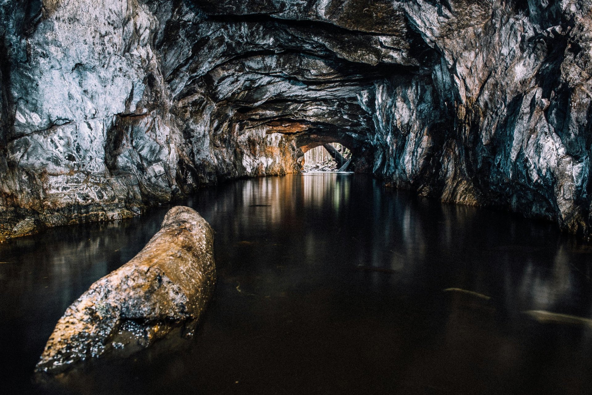 a cave partially submerged with water
