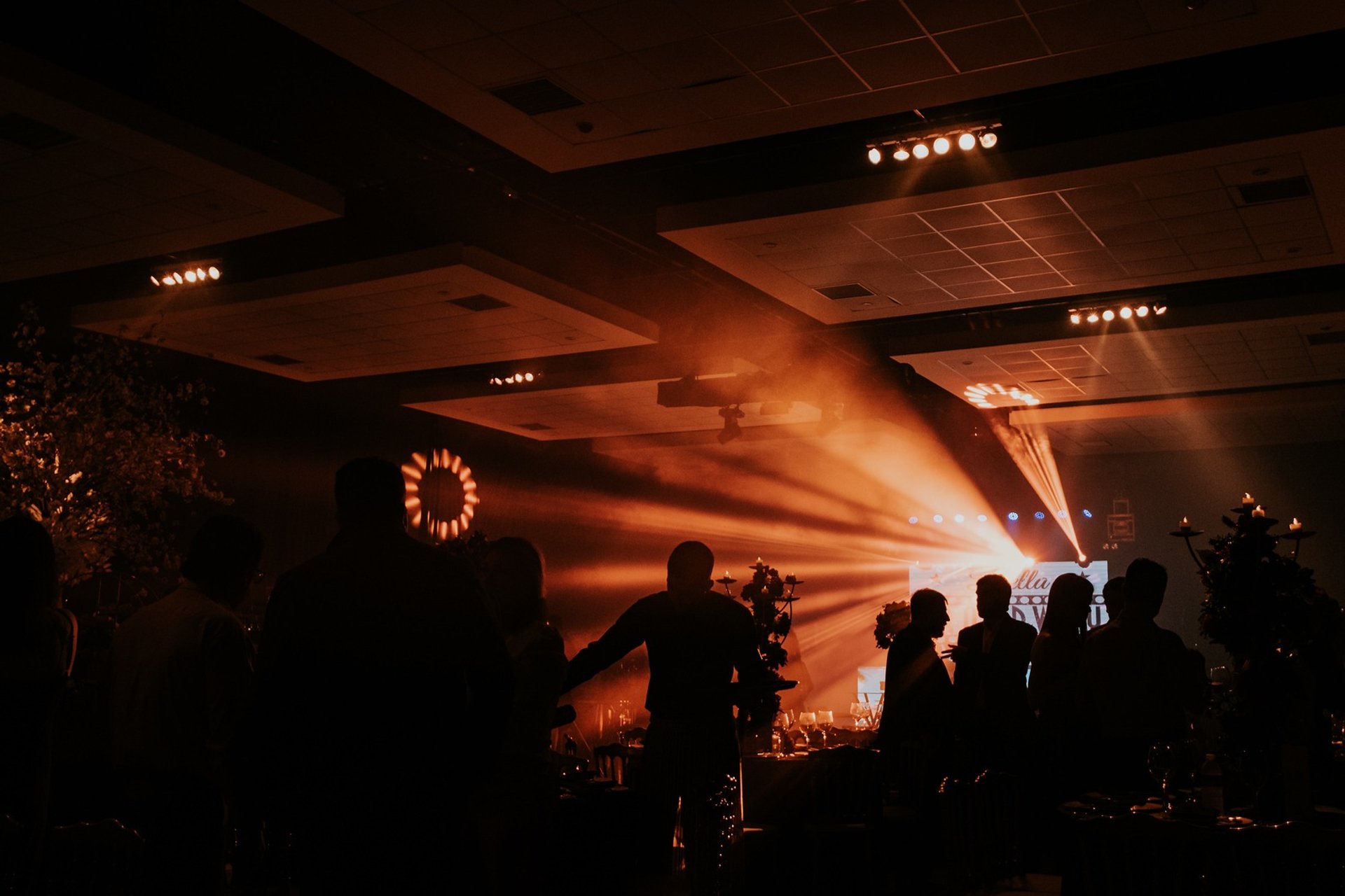 an abstract photo of a curved building with a blue sky in the background
