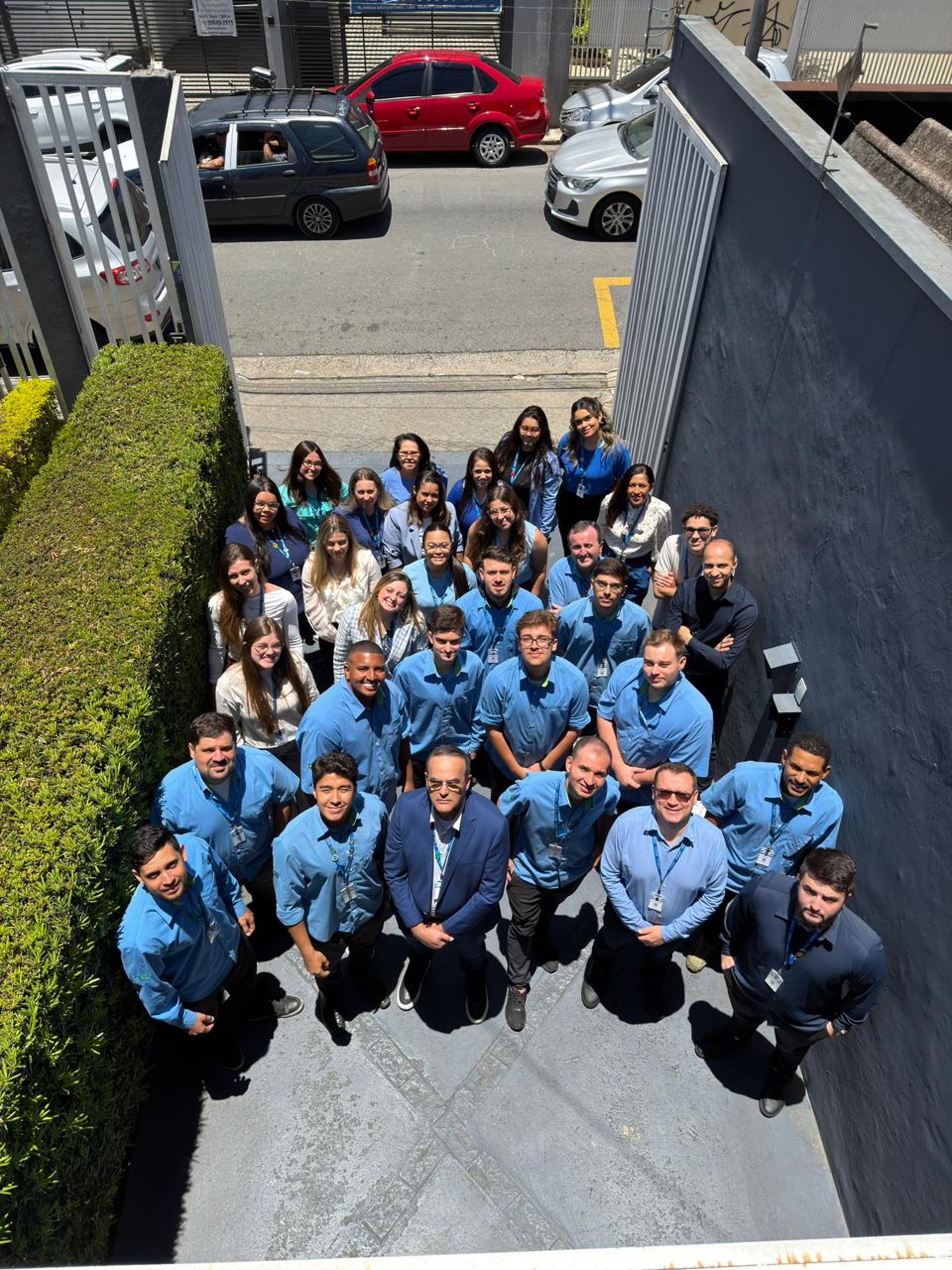 an abstract photo of a curved building with a blue sky in the background
