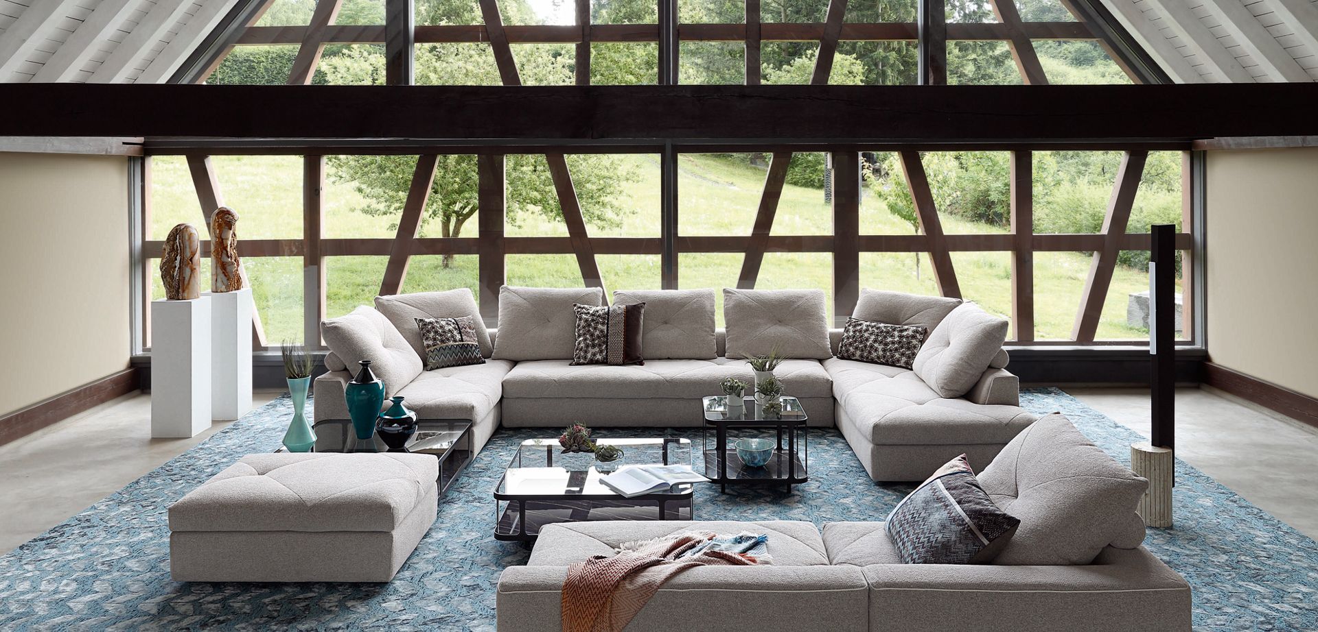 an abstract photo of a curved building with a blue sky in the background