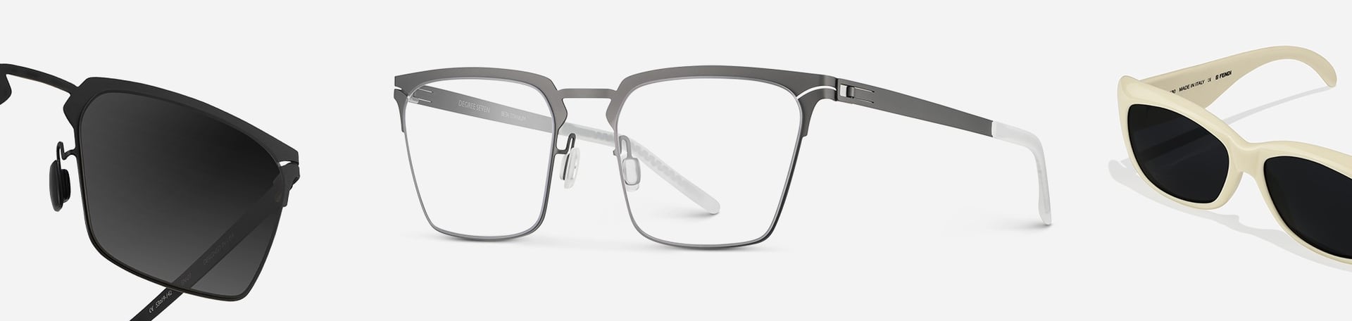 Modern eyewear product photography: sunglasses (black, white), silver optical frame. Professional photographer USA.