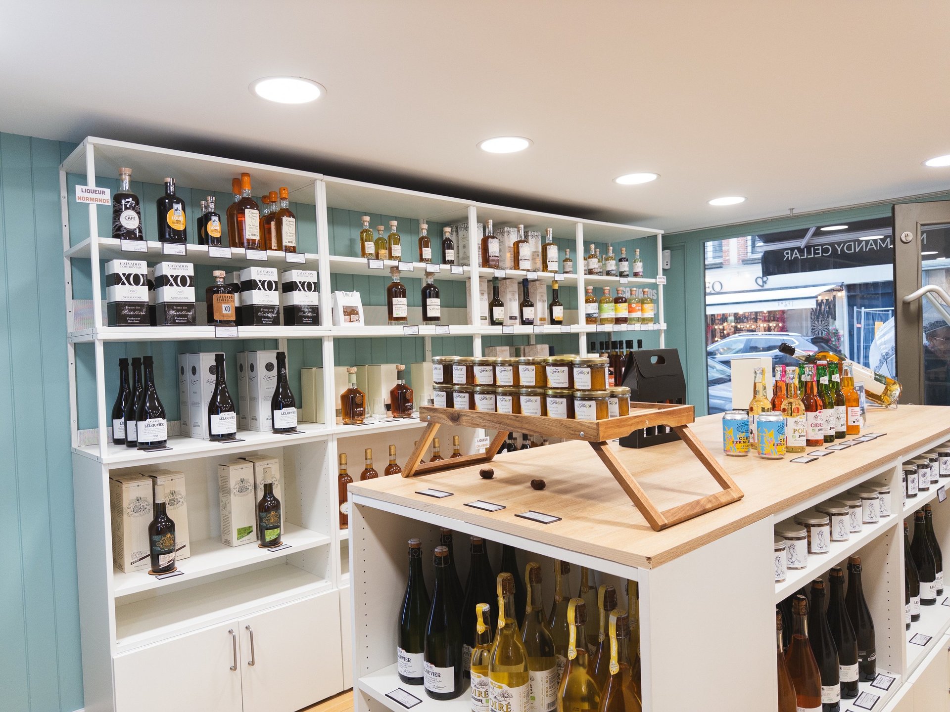 an abstract photo of a curved building with a blue sky in the background
