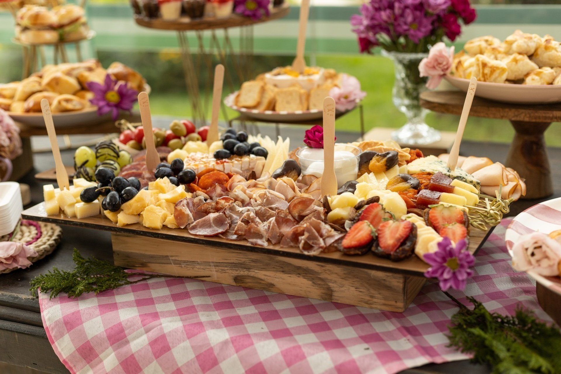 sliced strawberries and sliced strawberries on brown wooden round plate