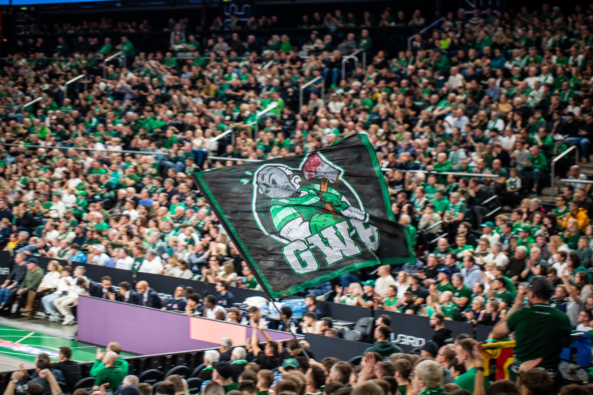 a close up of a black and brown abstract painting