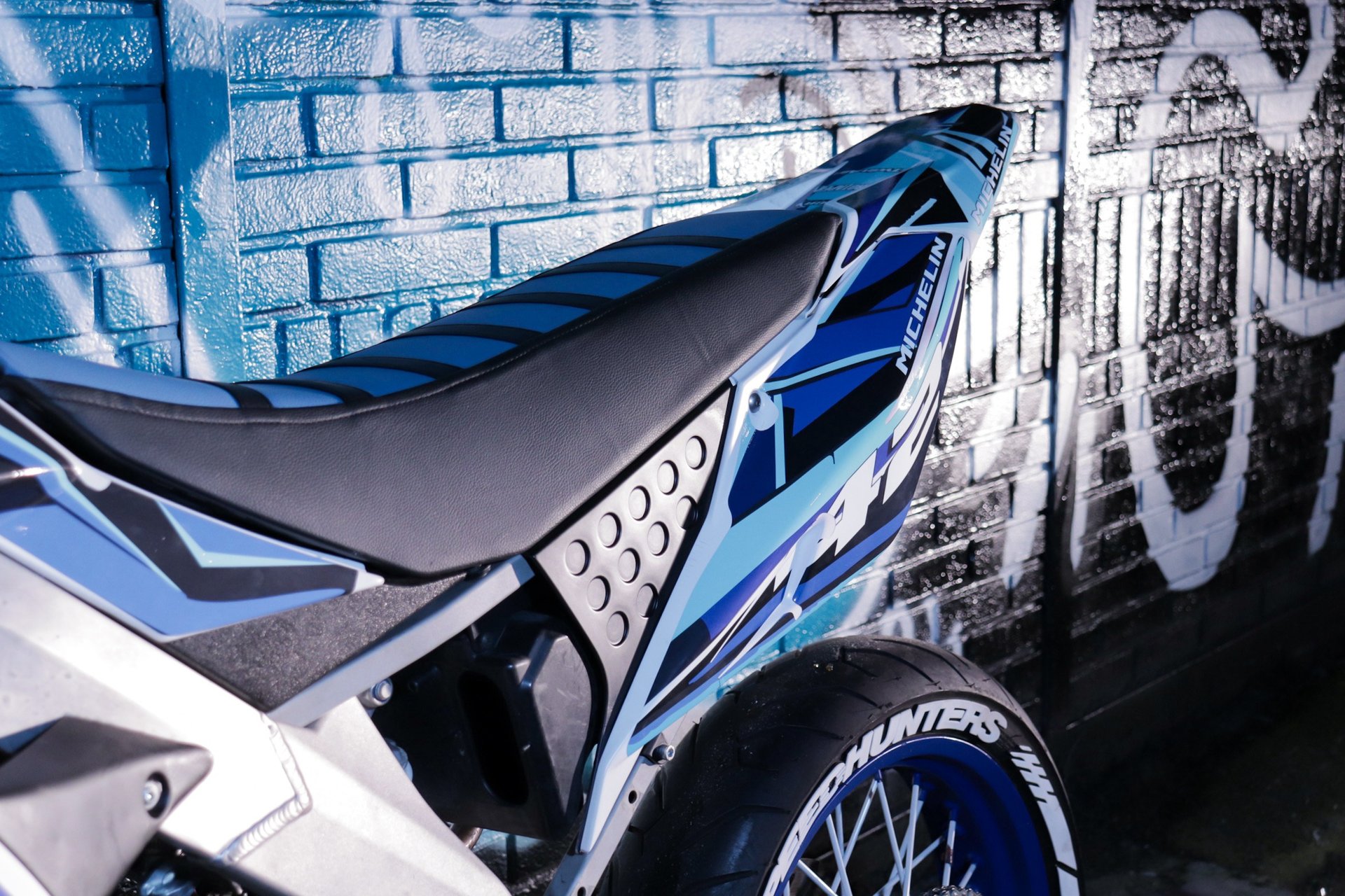 a close up of a motorcycle tire and spokes