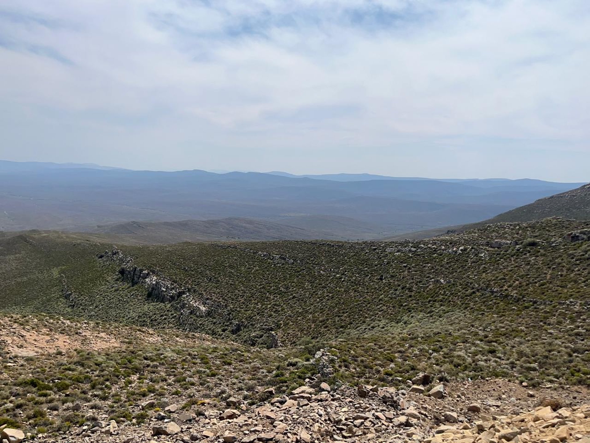 a green valley with a road