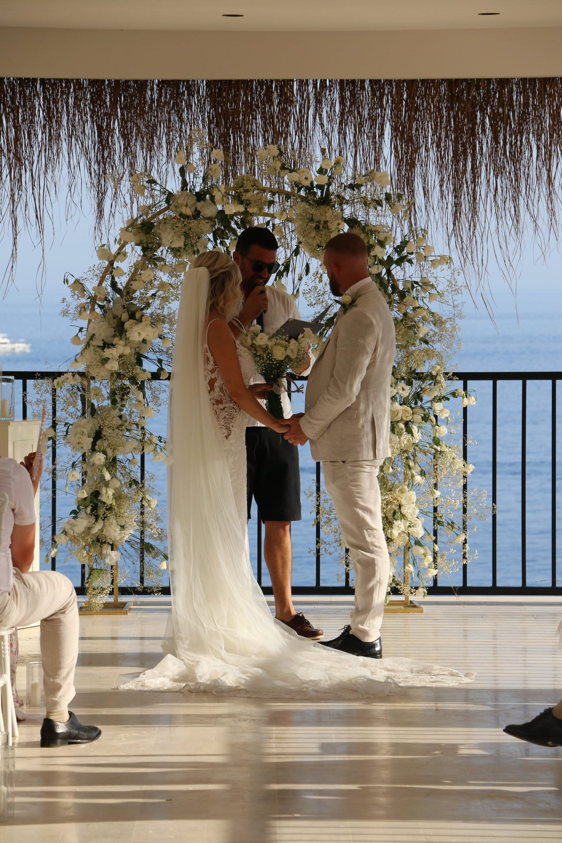 an abstract photo of a curved building with a blue sky in the background