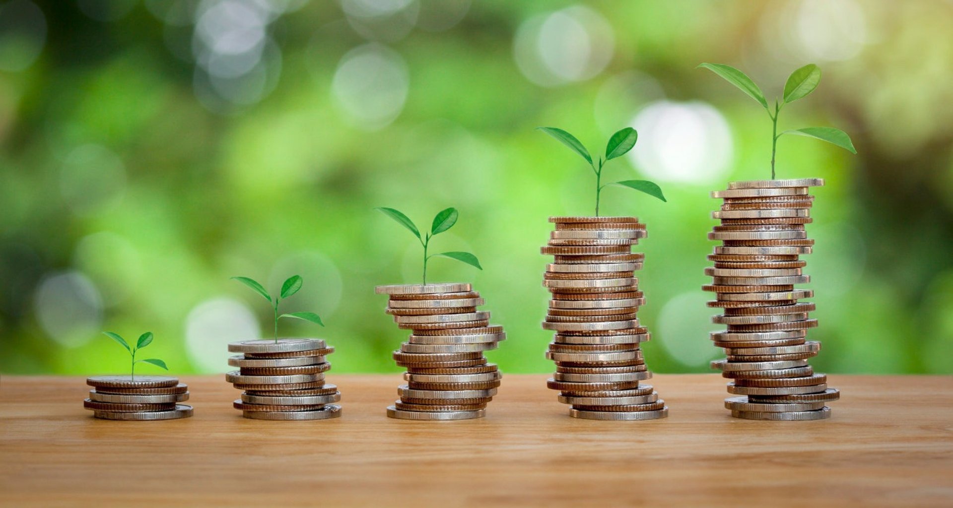 5 growing piles of coins