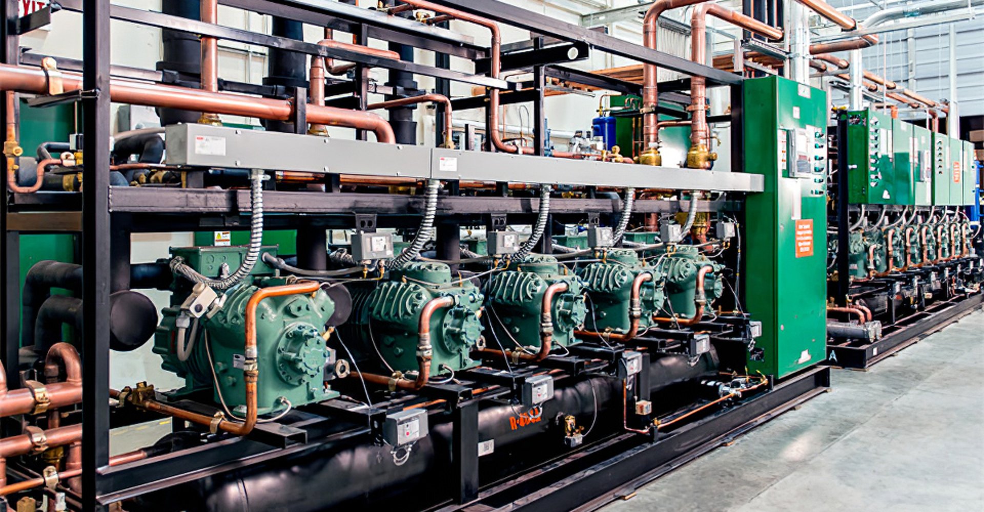 black and brown leather padded tub sofa