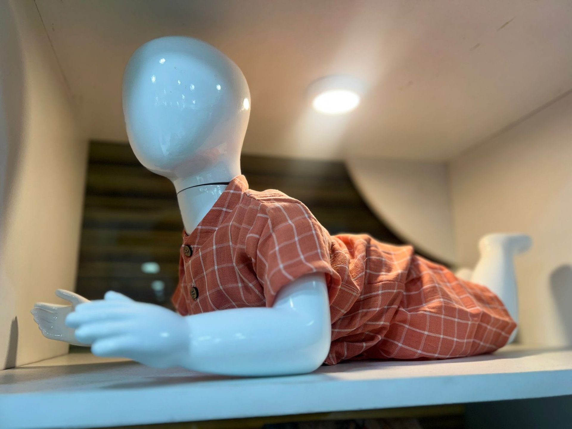 woman wearing yellow long-sleeved dress under white clouds and blue sky during daytime