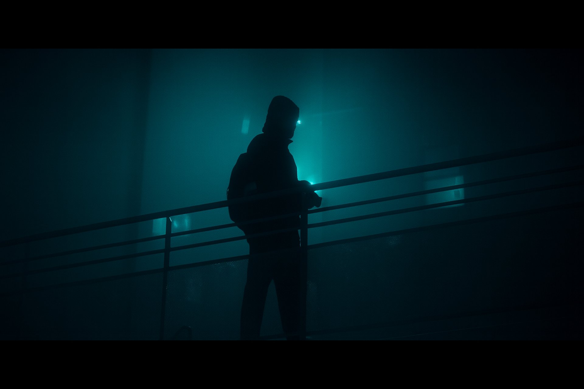 a person standing on a balcony