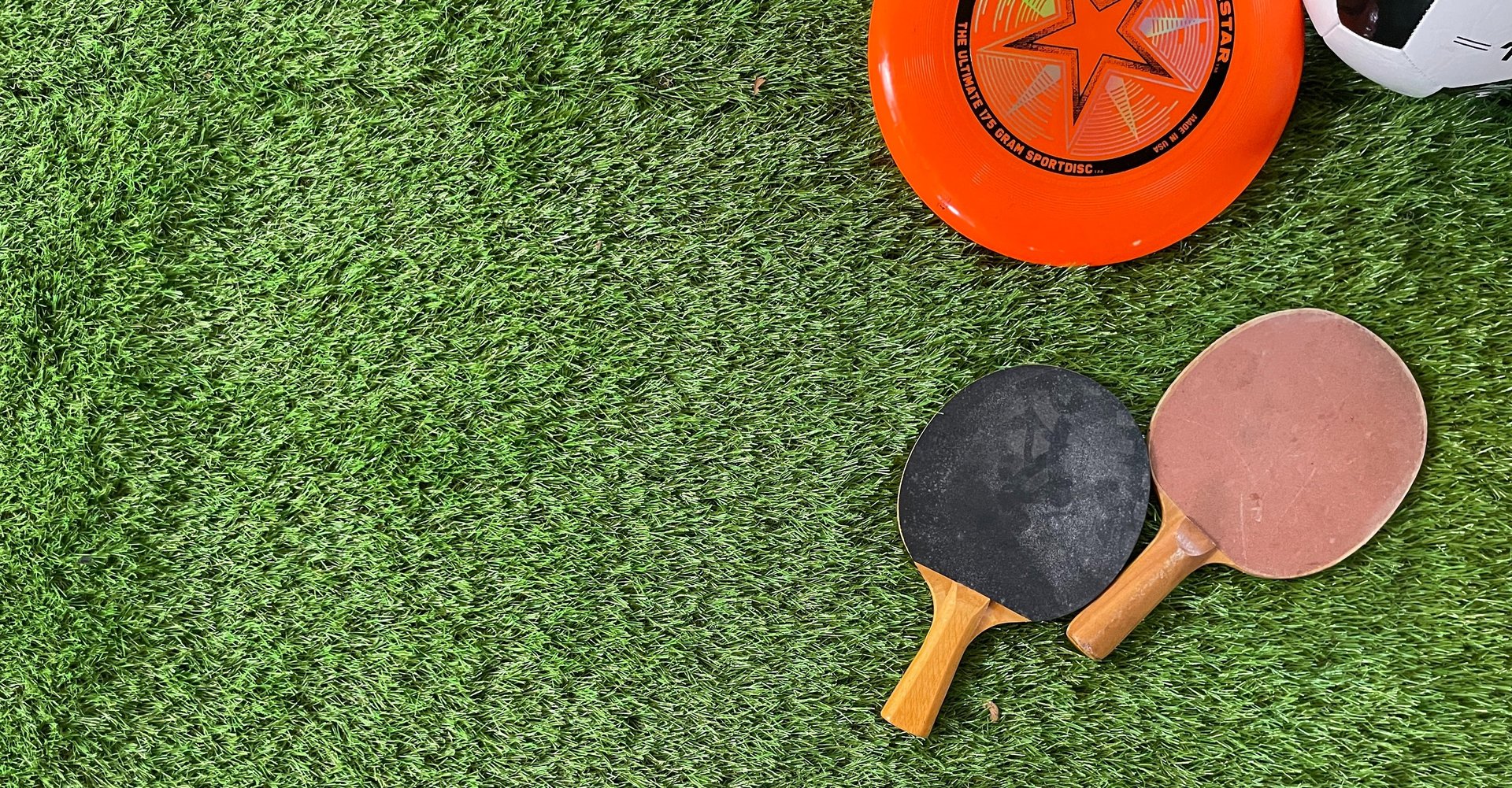 grass texture and sports items banner