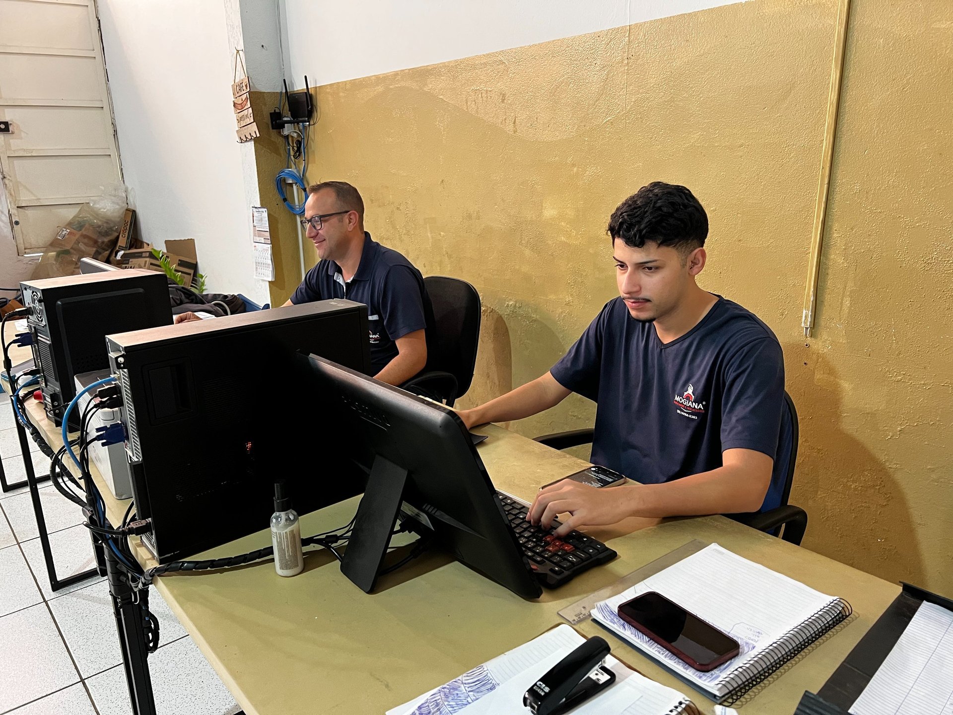 person typing on silver MacBook