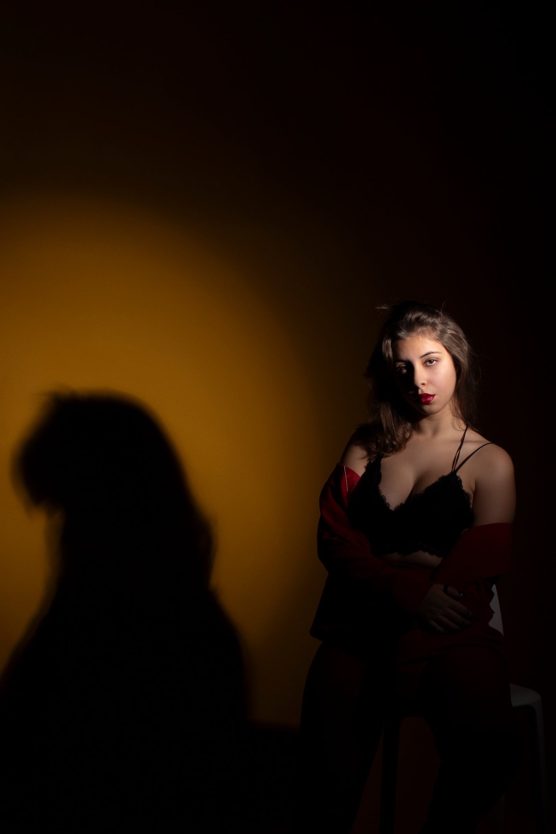 an abstract photo of a curved building with a blue sky in the background