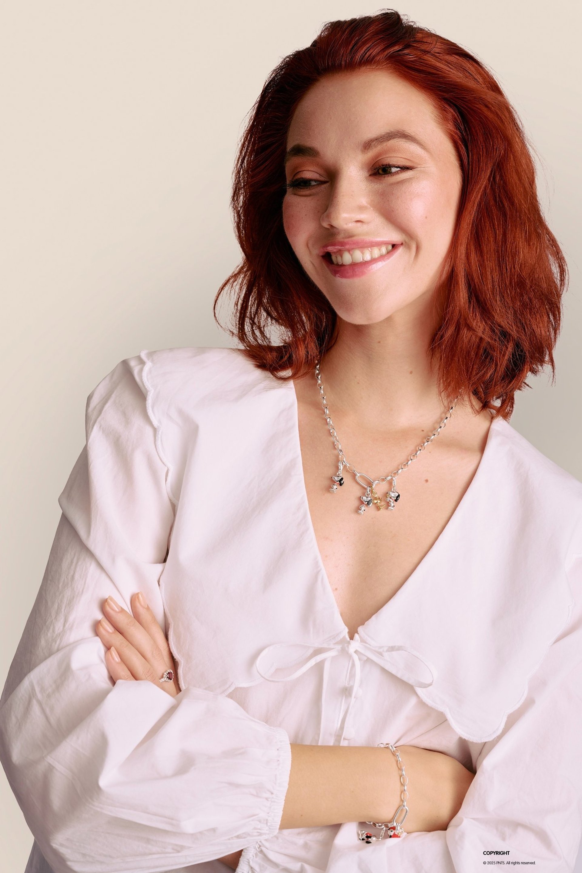 woman wearing yellow long-sleeved dress under white clouds and blue sky during daytime