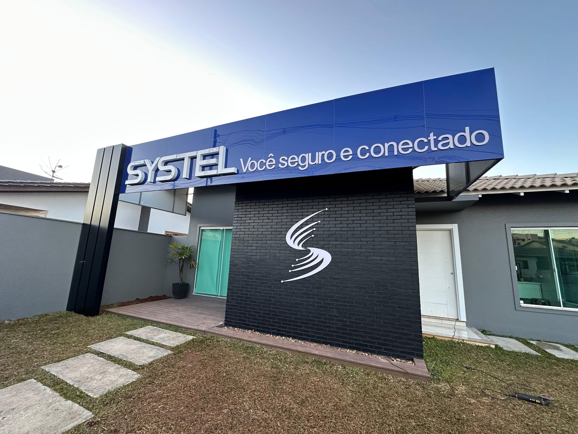 woman wearing yellow long-sleeved dress under white clouds and blue sky during daytime