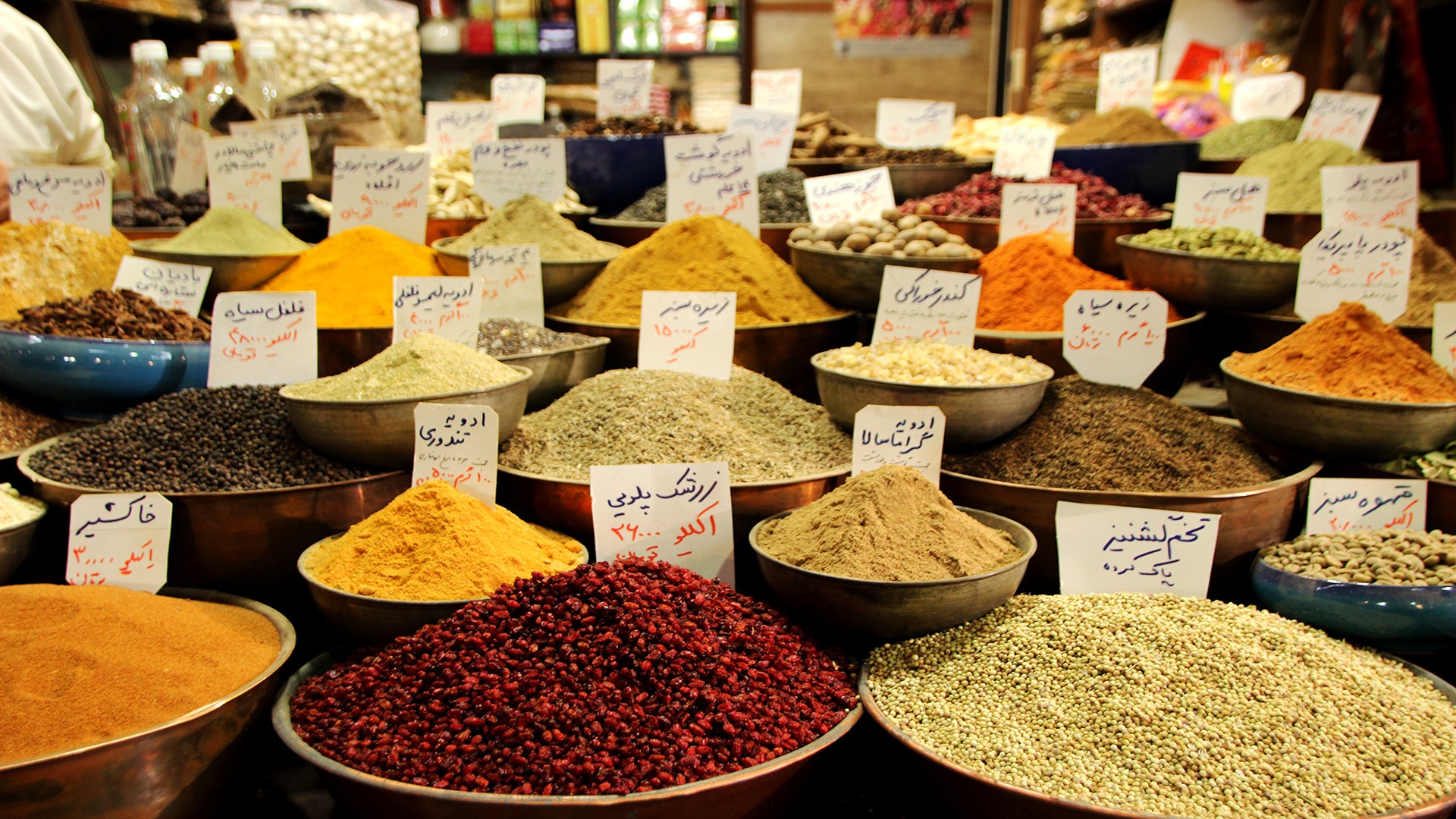 a table topped with different types of spices