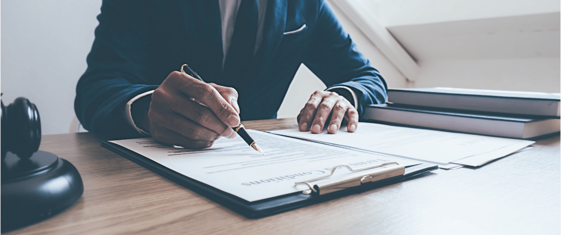an abstract photo of a curved building with a blue sky in the background