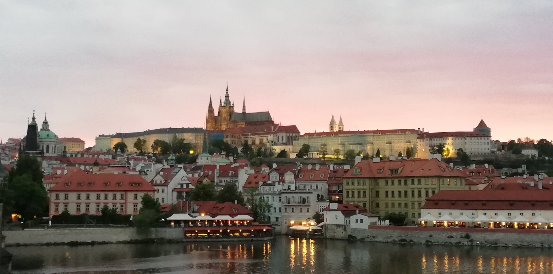 woman wearing yellow long-sleeved dress under white clouds and blue sky during daytime