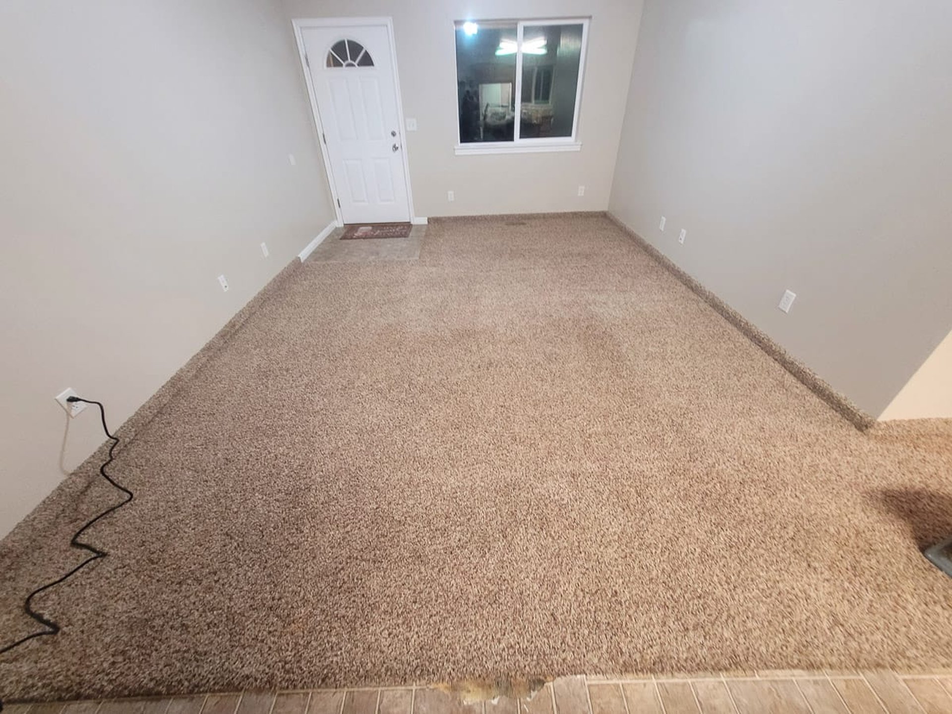 an abstract photo of a curved building with a blue sky in the background