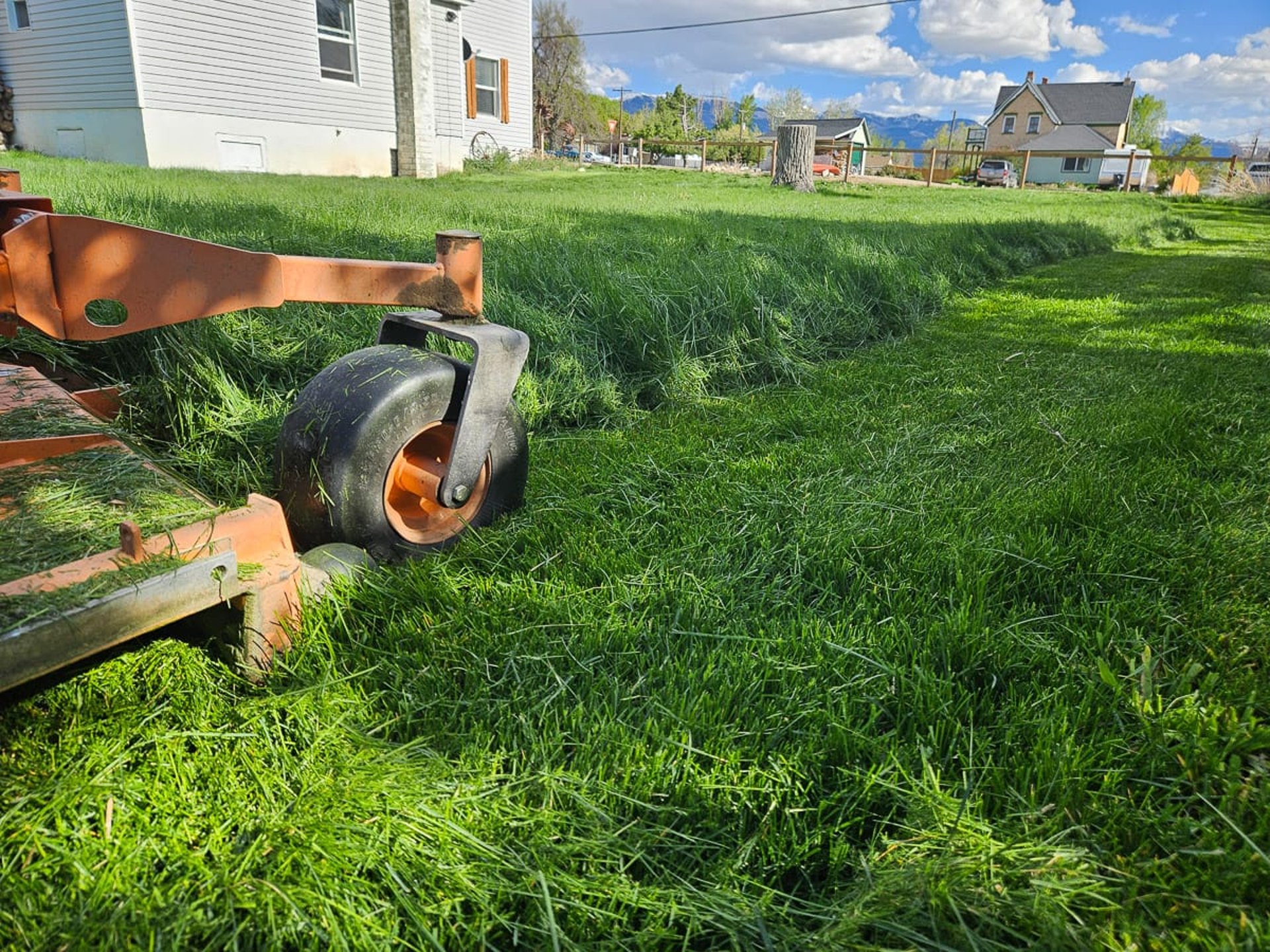 an abstract photo of a curved building with a blue sky in the background