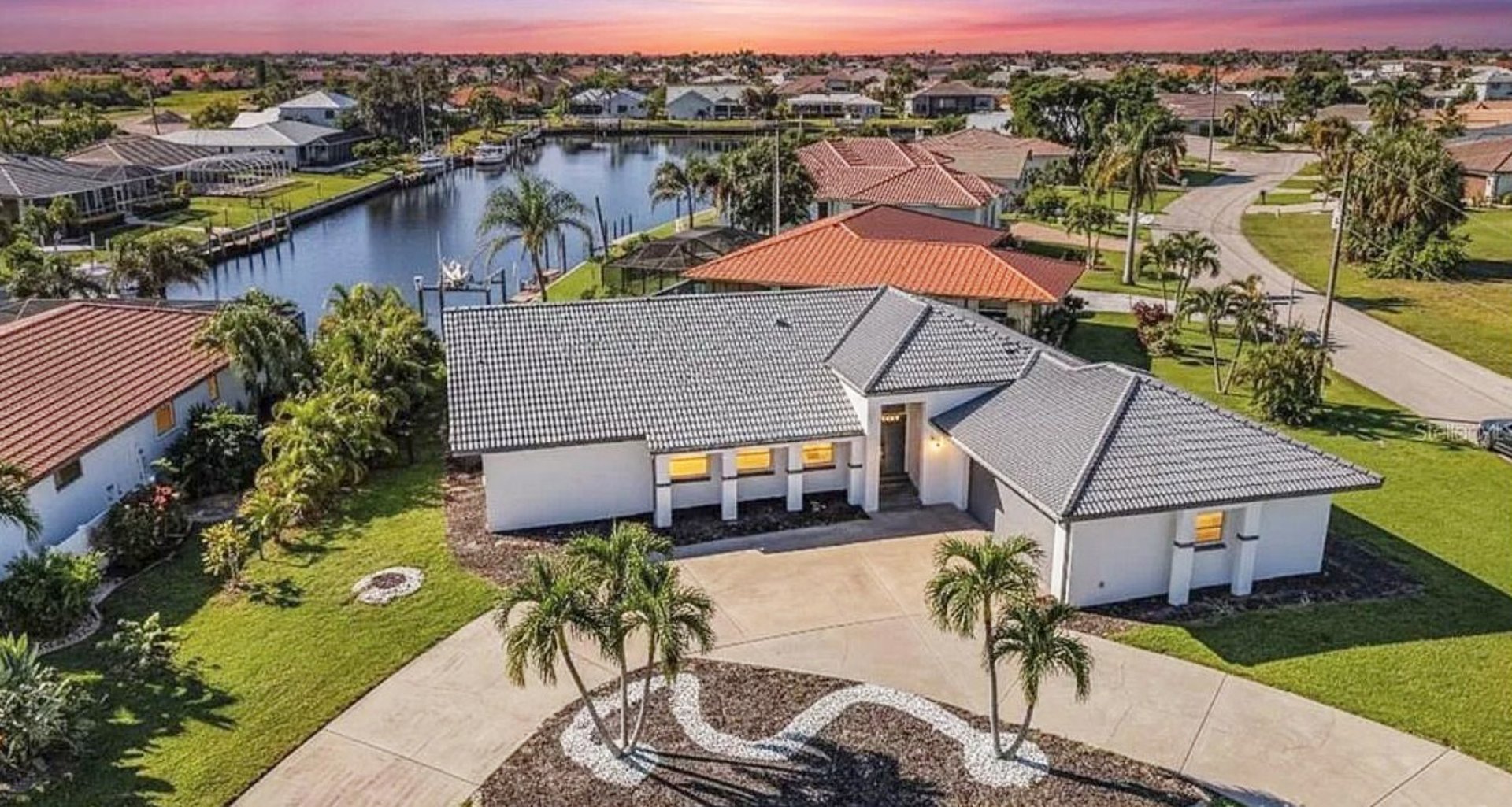 black and brown leather padded tub sofa