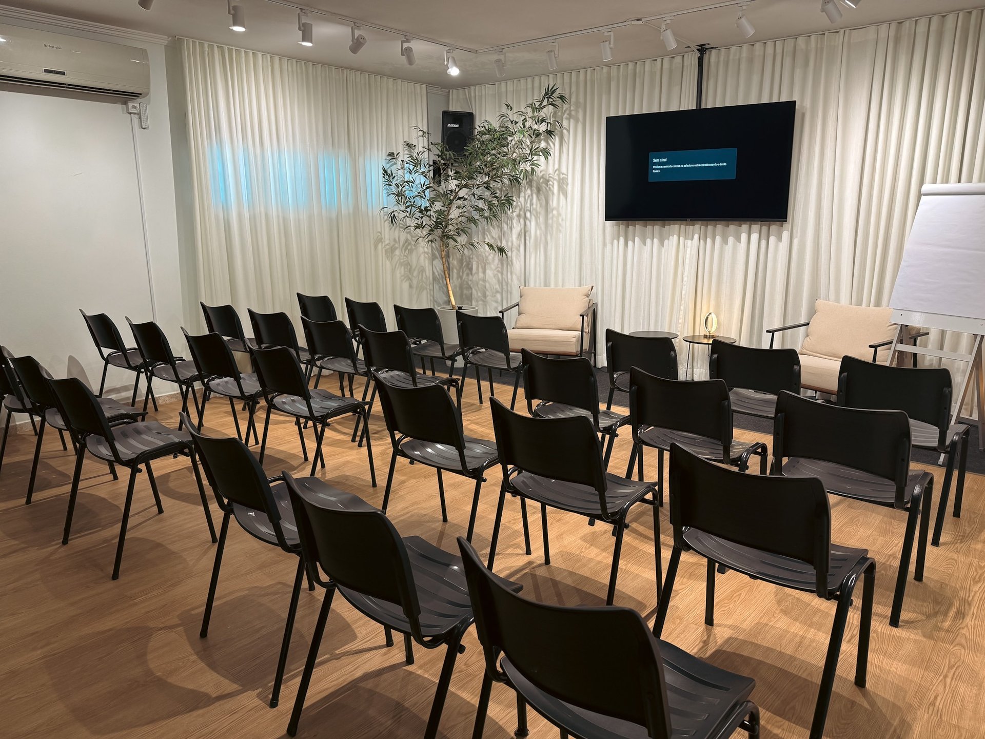an abstract photo of a curved building with a blue sky in the background