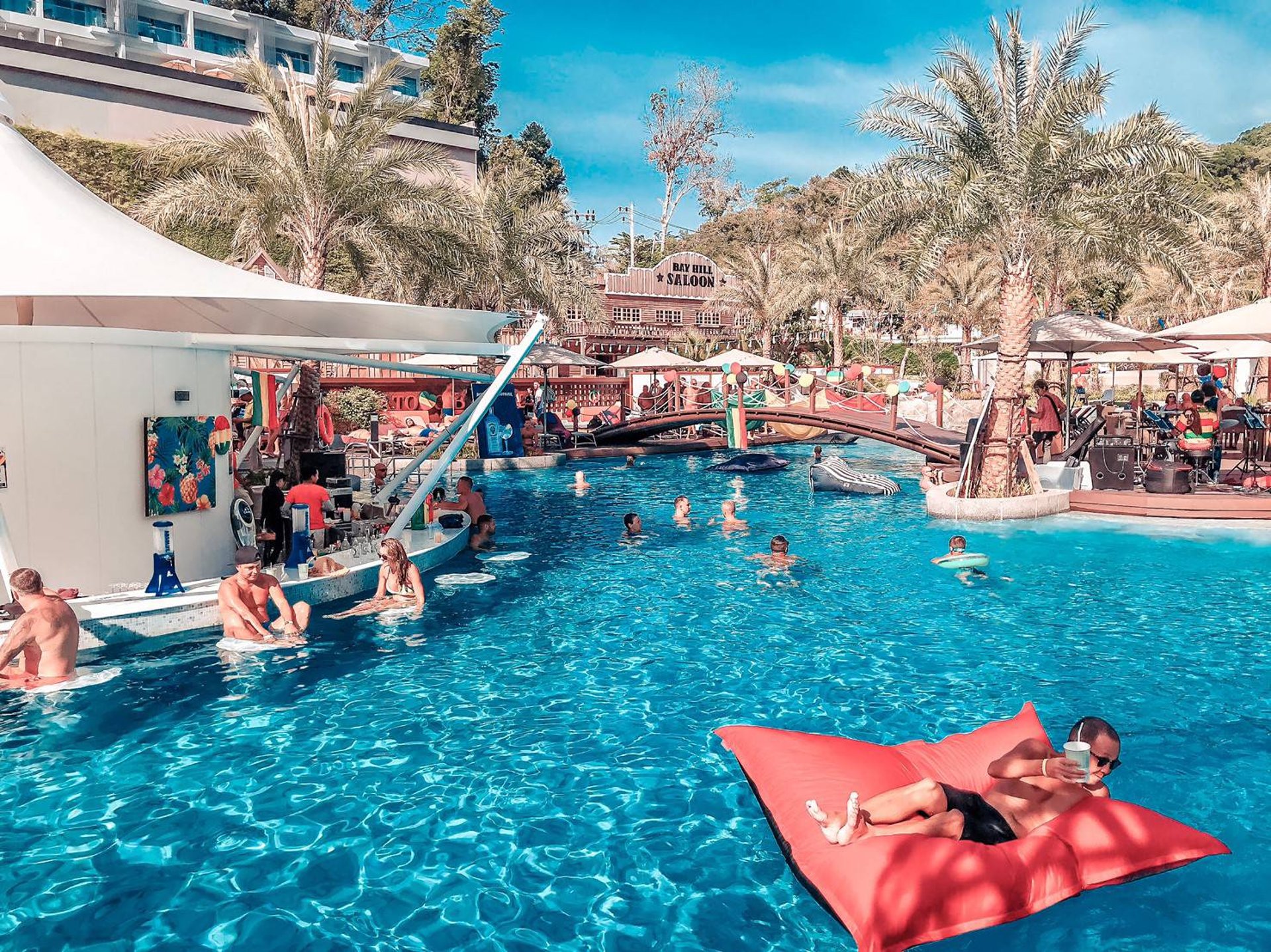 woman wearing yellow long-sleeved dress under white clouds and blue sky during daytime