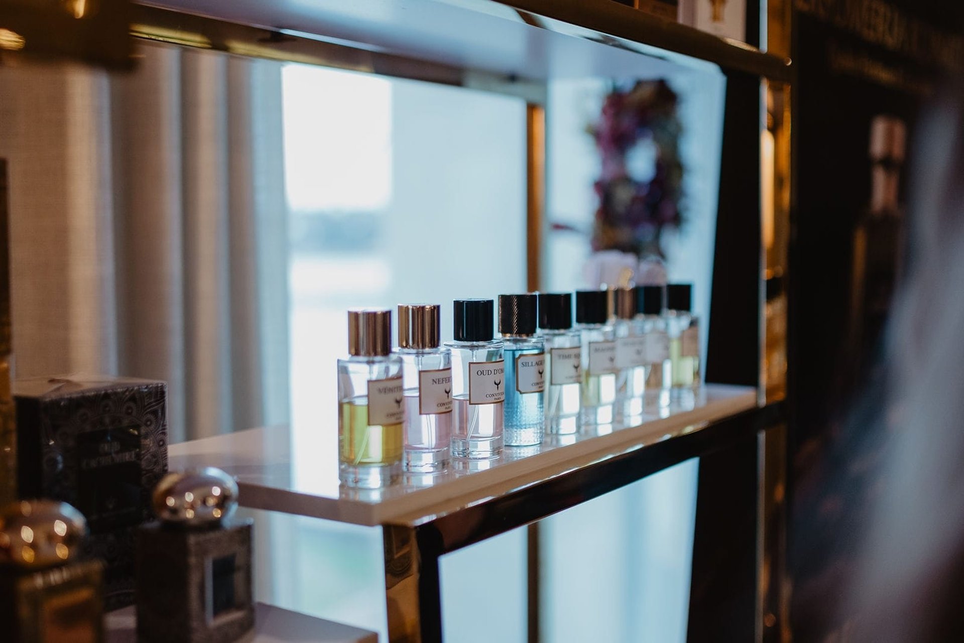 an abstract photo of a curved building with a blue sky in the background