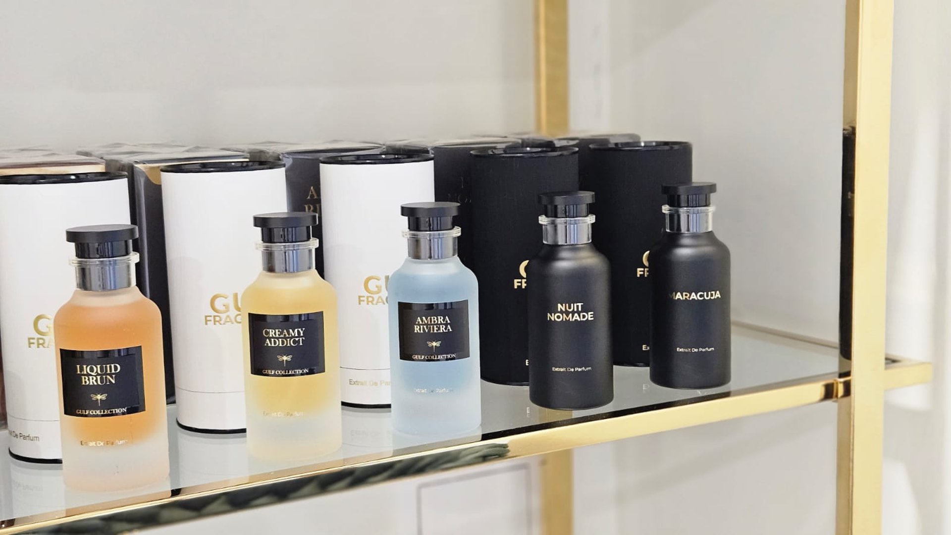 an abstract photo of a curved building with a blue sky in the background