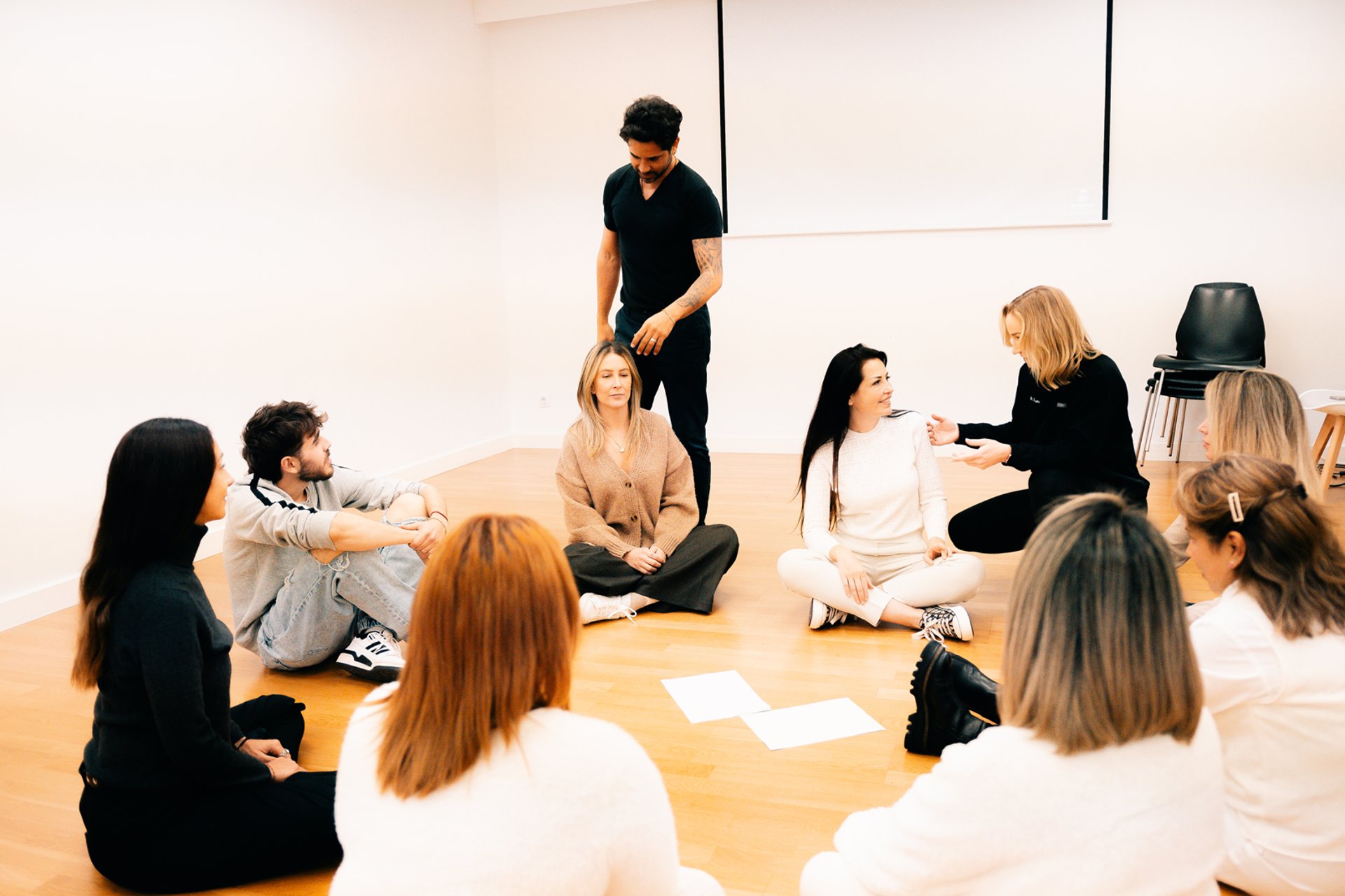 a group of people sitting at tables