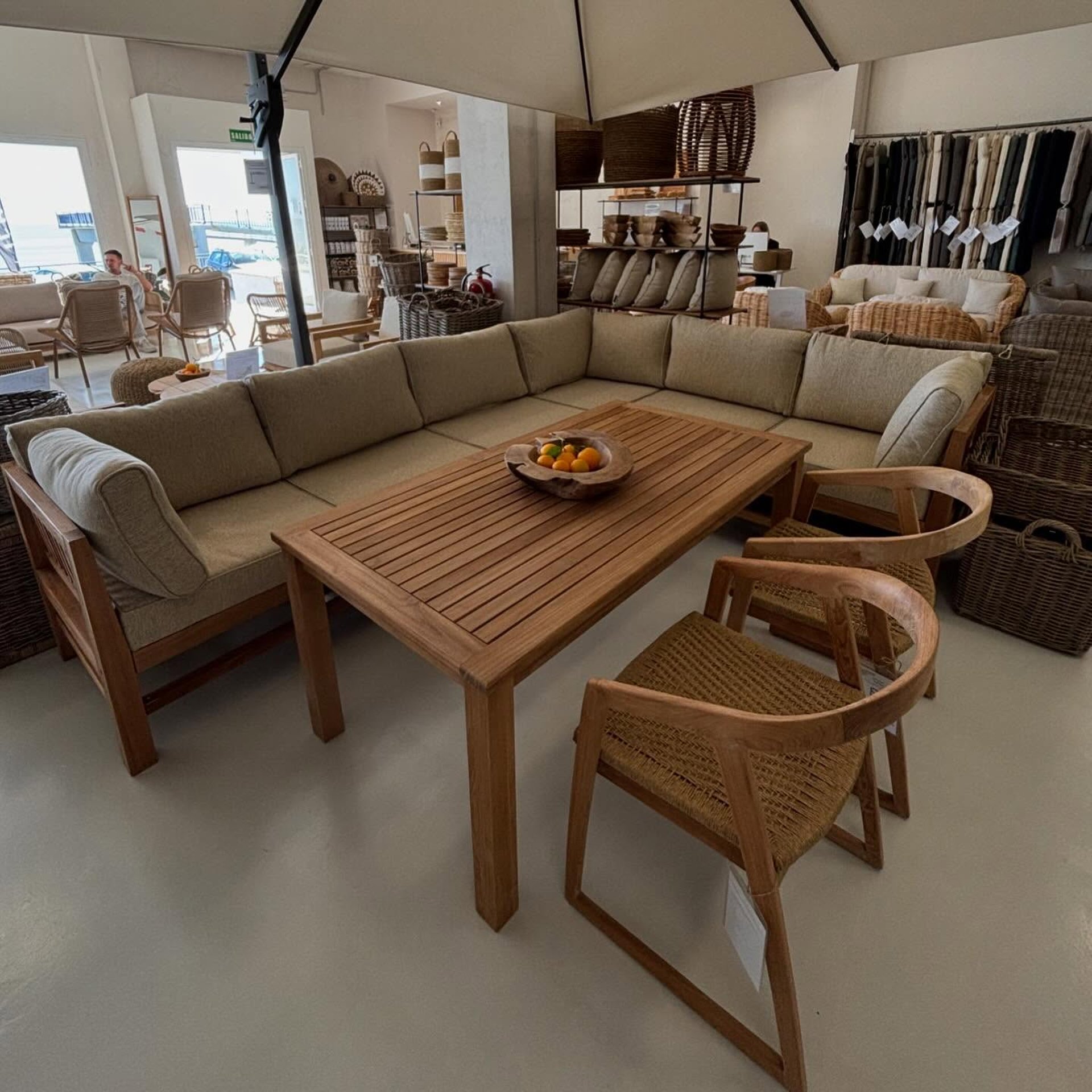 an abstract photo of a curved building with a blue sky in the background