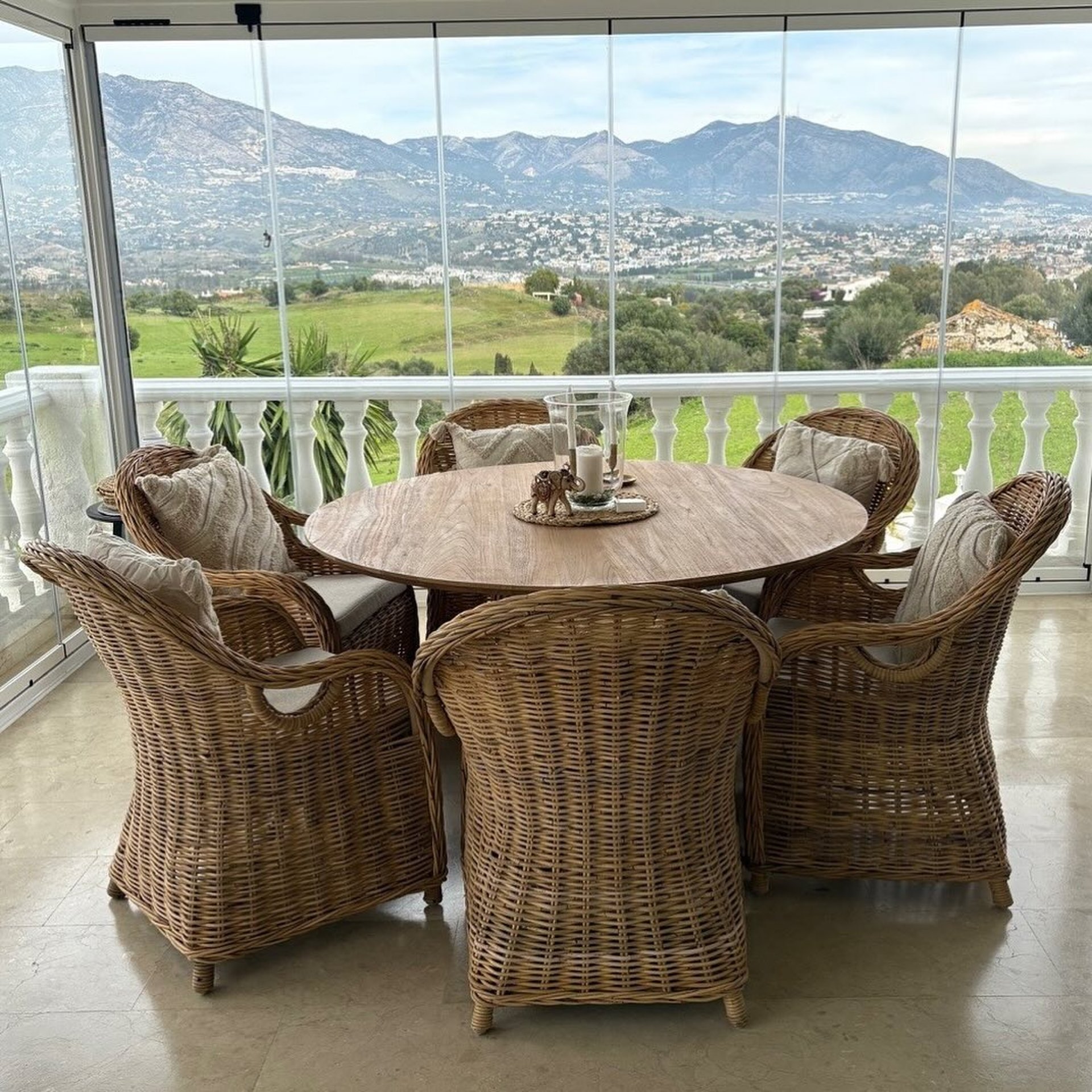 an abstract photo of a curved building with a blue sky in the background