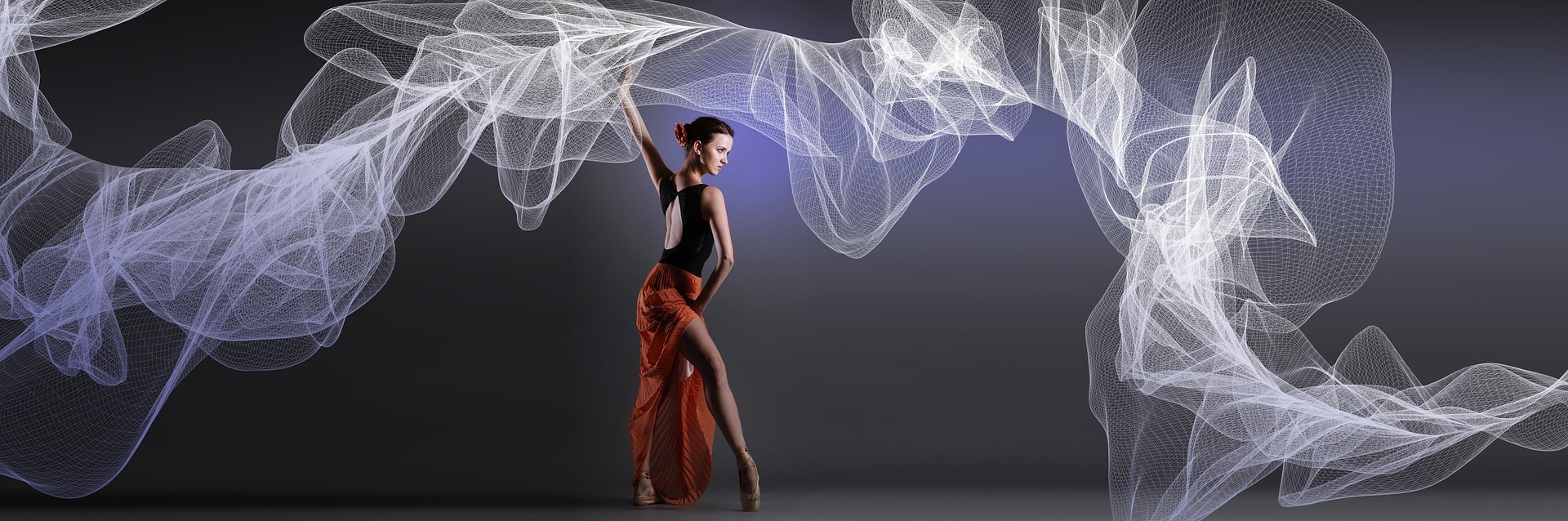 an abstract photo of a curved building with a blue sky in the background