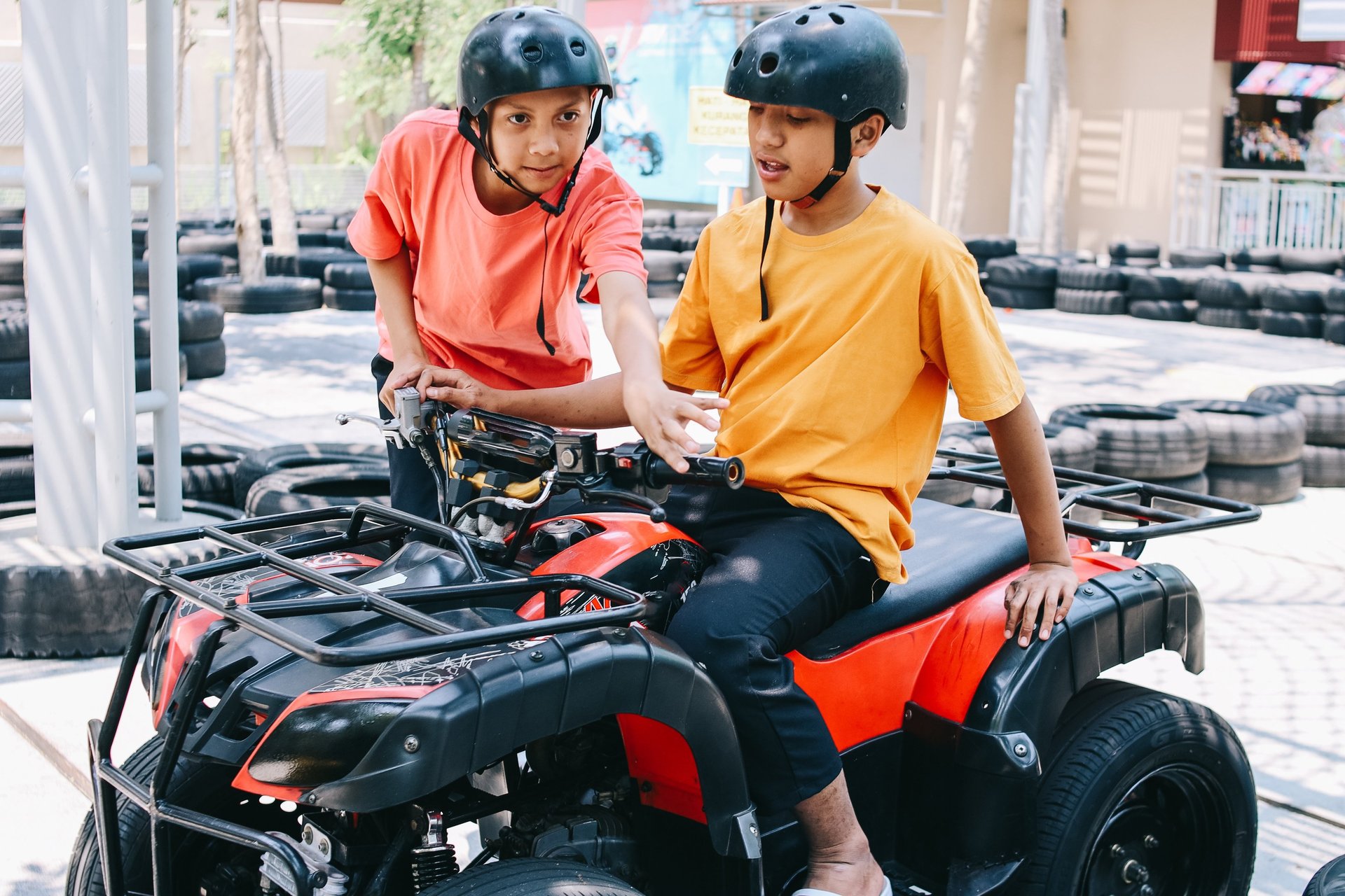 Boys driving a quad