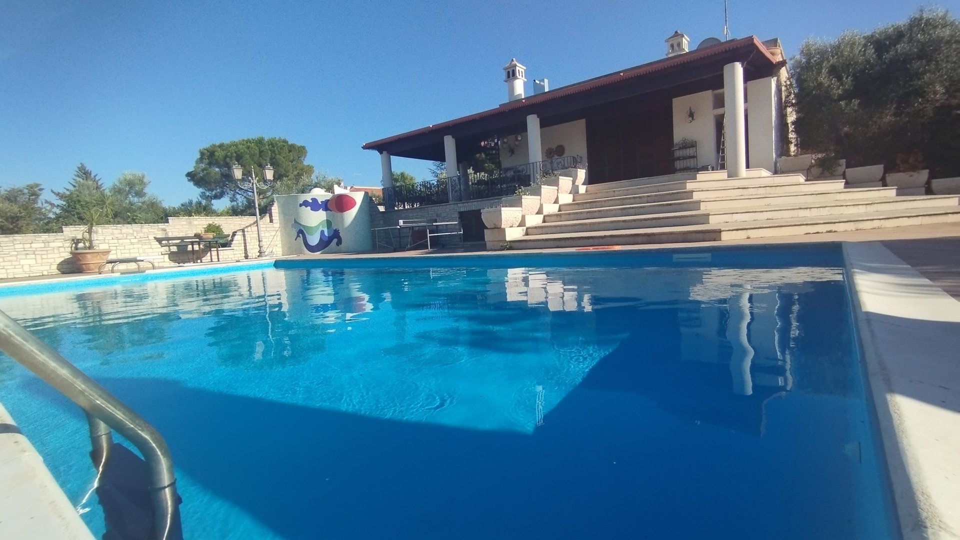 black and brown leather padded tub sofa