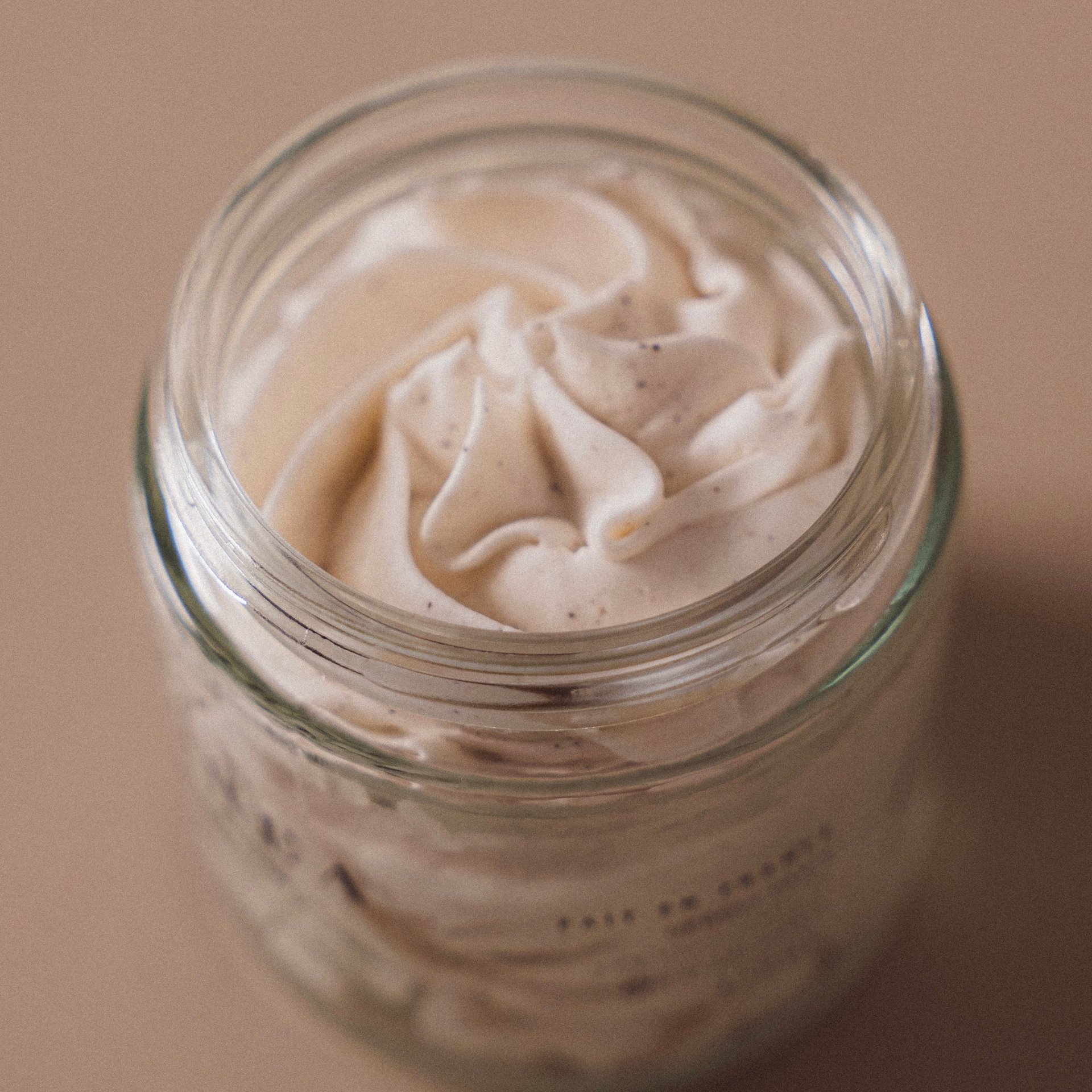 person holding brown stone fragment