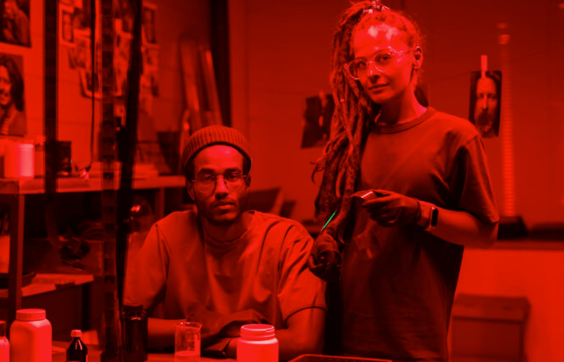 grayscale photo of person using MacBook