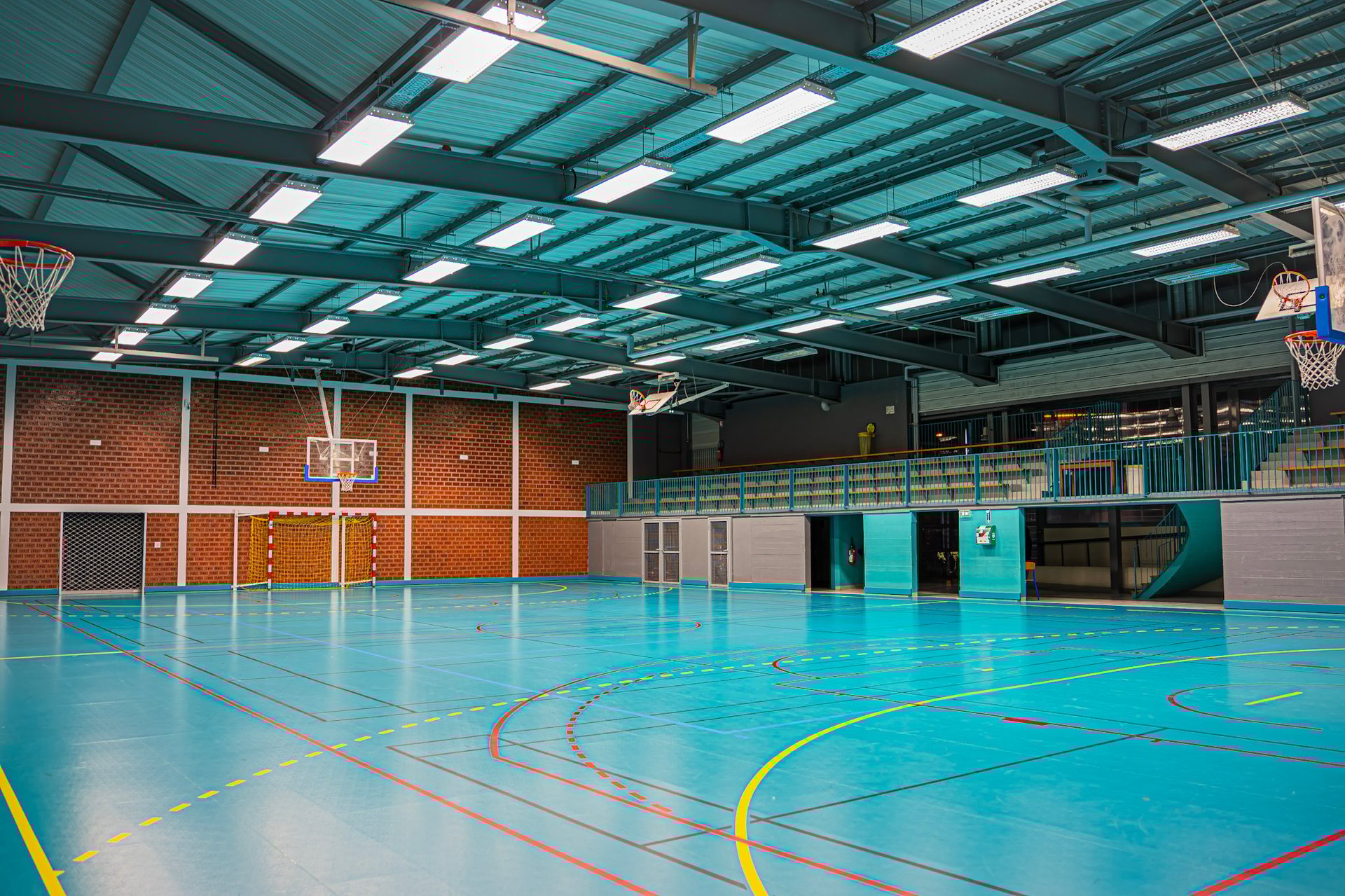 black and brown leather padded tub sofa
