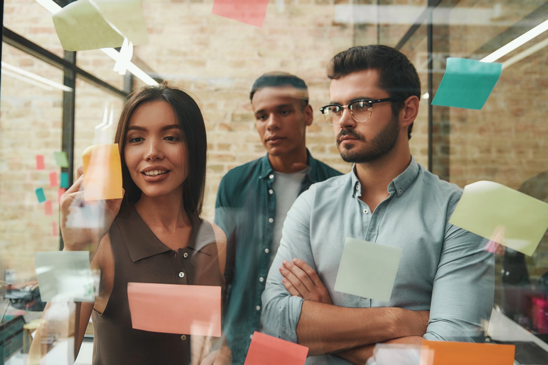 black and brown leather padded tub sofa