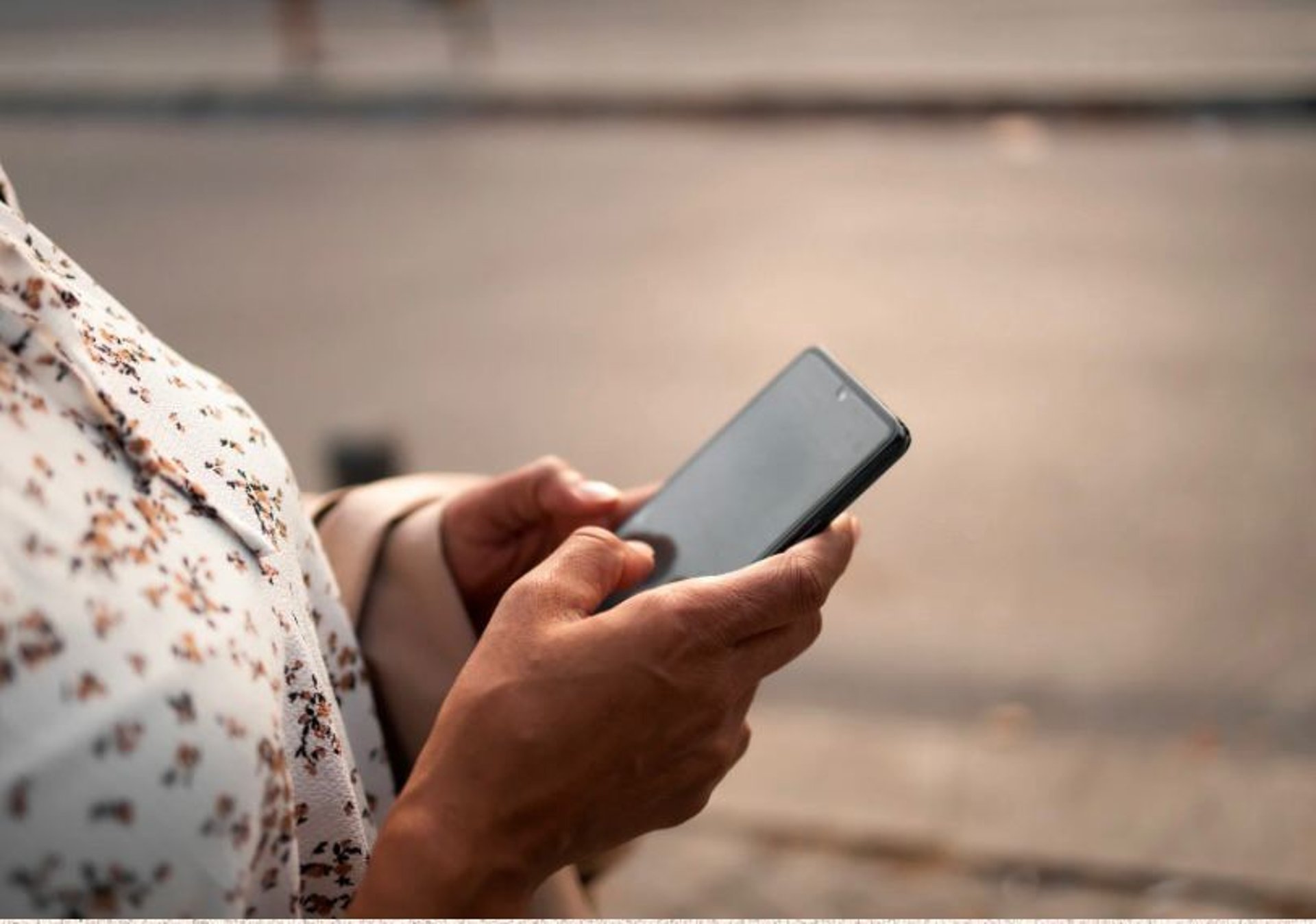 person holding white android smartphone