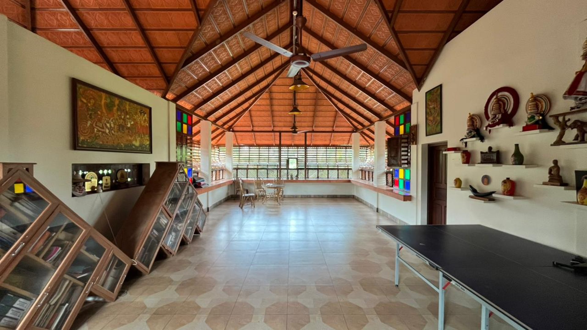 green palm trees near swimming pool during daytime