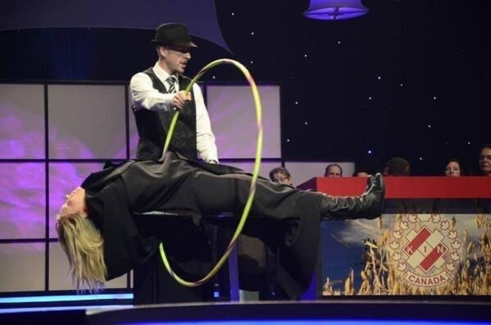 an abstract photo of a curved building with a blue sky in the background