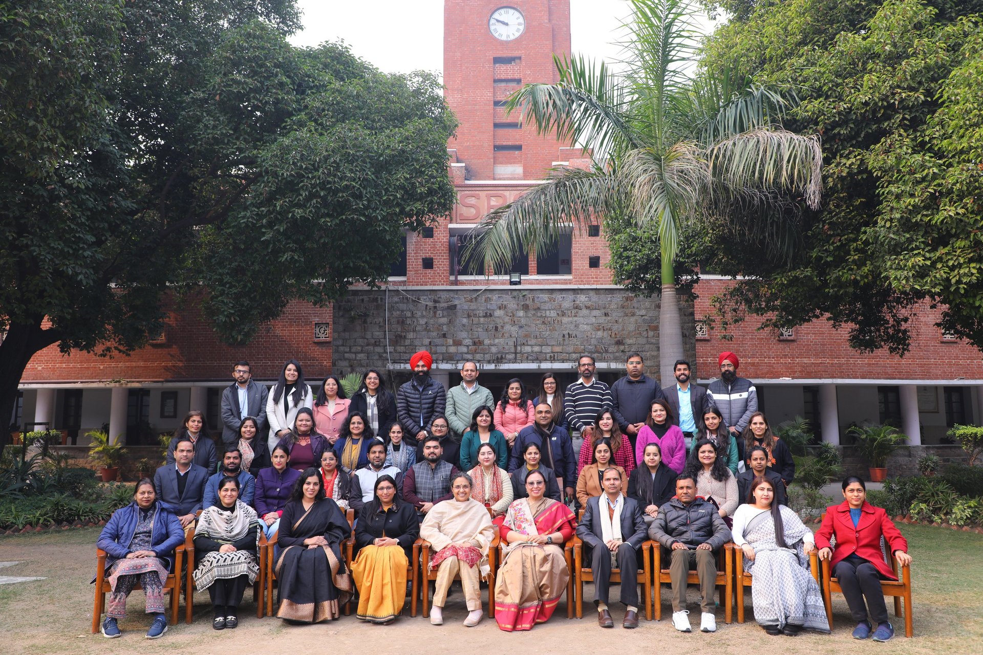 an abstract photo of a curved building with a blue sky in the background